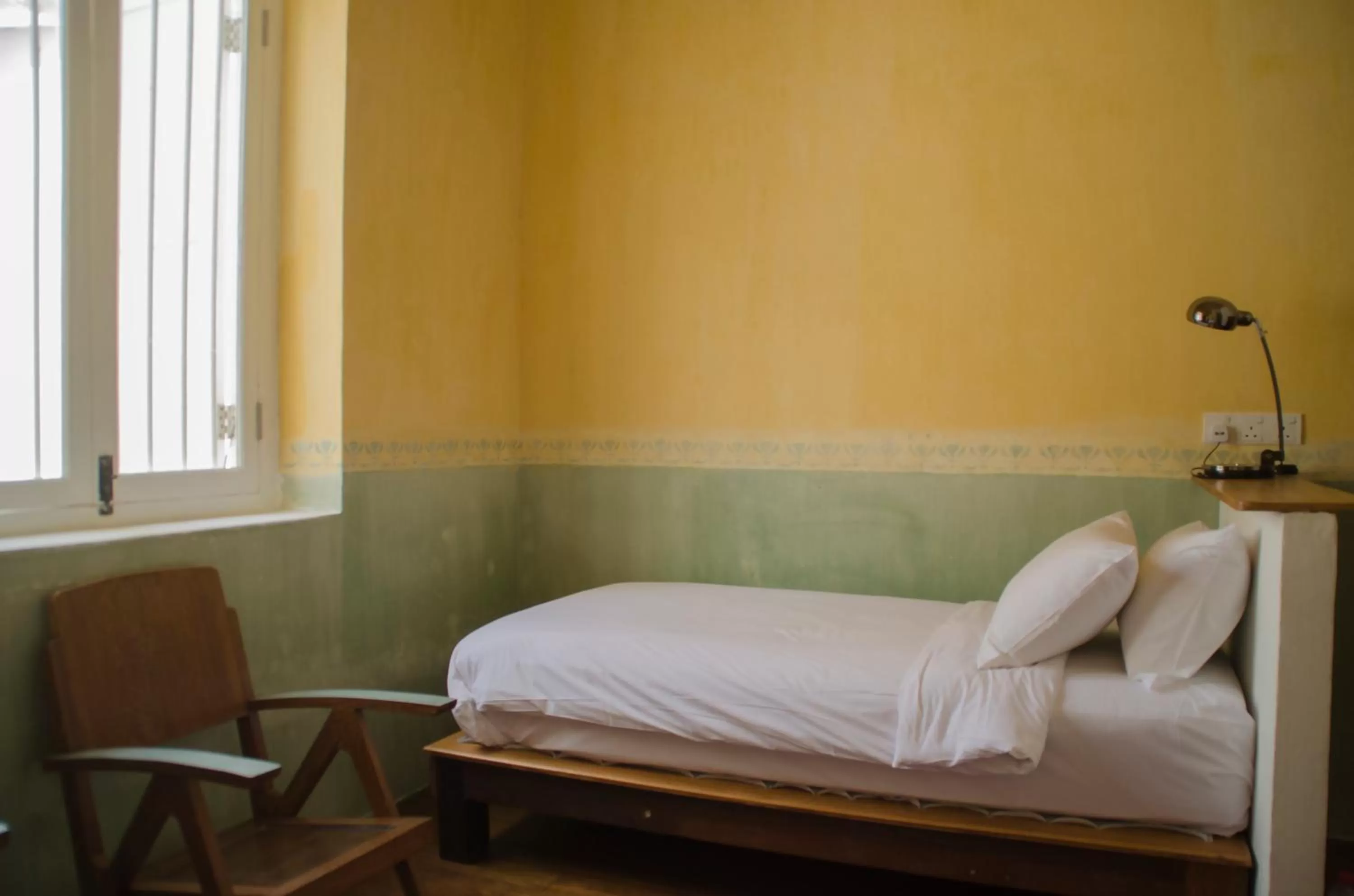 Bed in Ren I Tang Heritage Inn