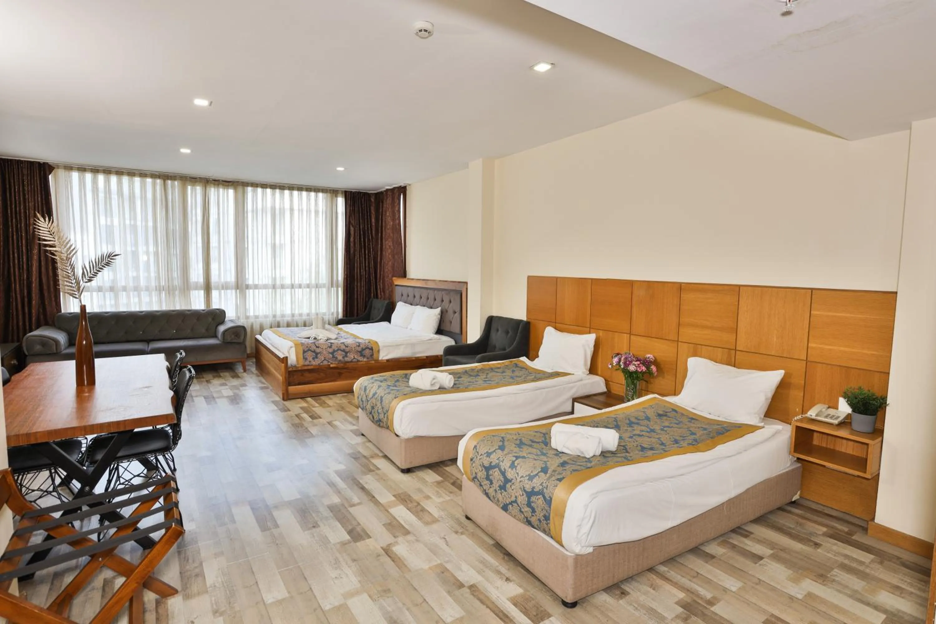 Living room, Bed in Cumbali Plaza Hotel