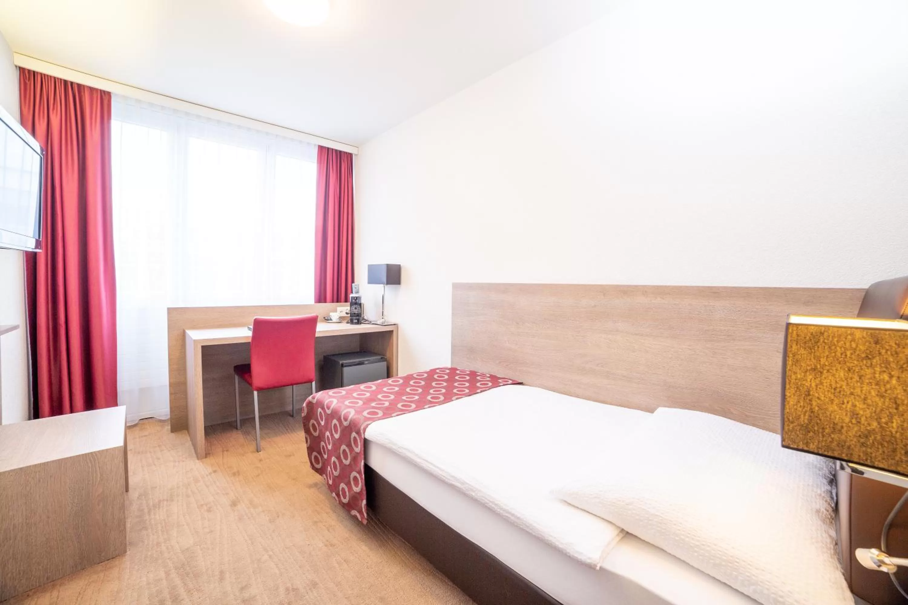 Bed in Hotel Alexander