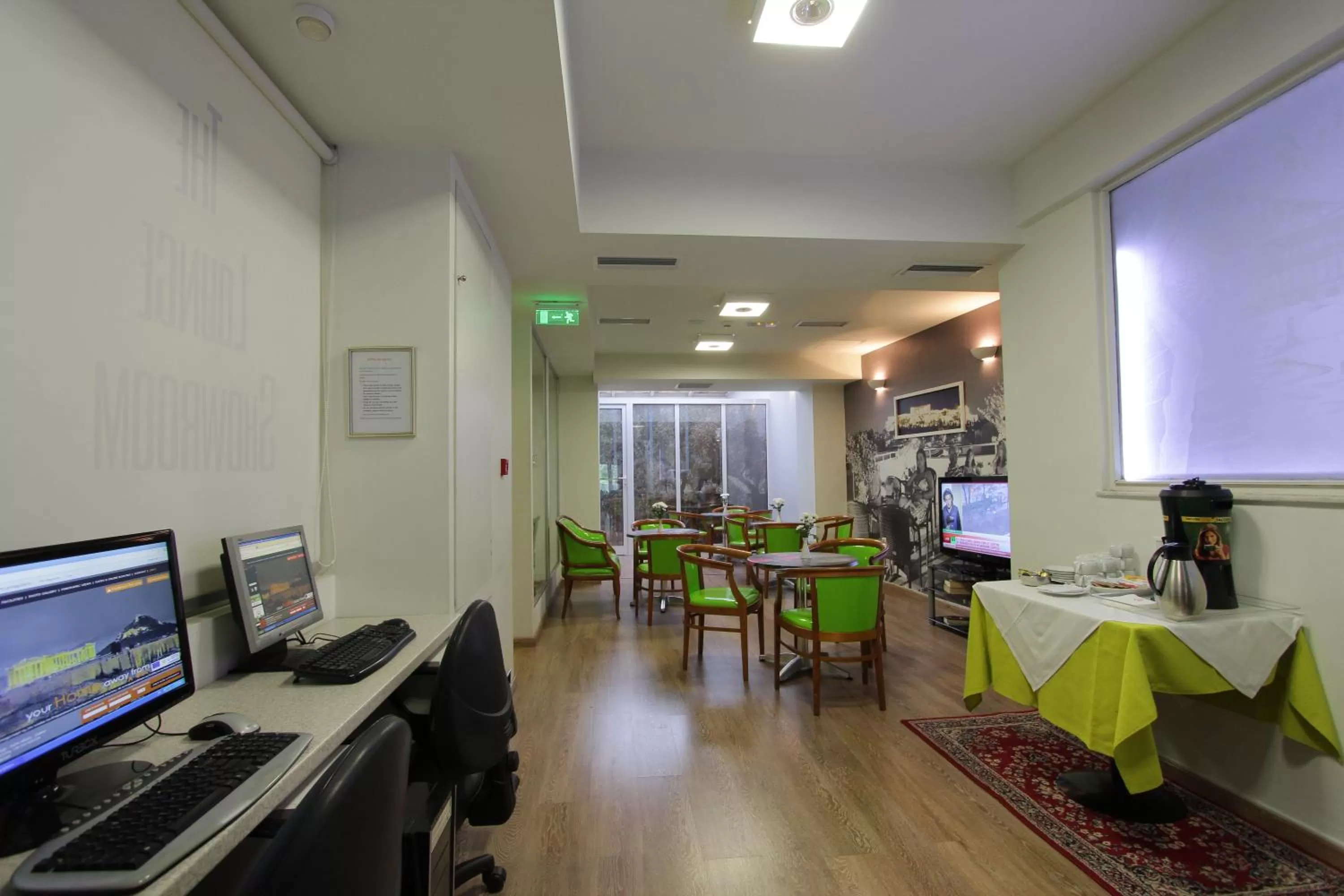 Communal lounge/ TV room in Attalos Hotel