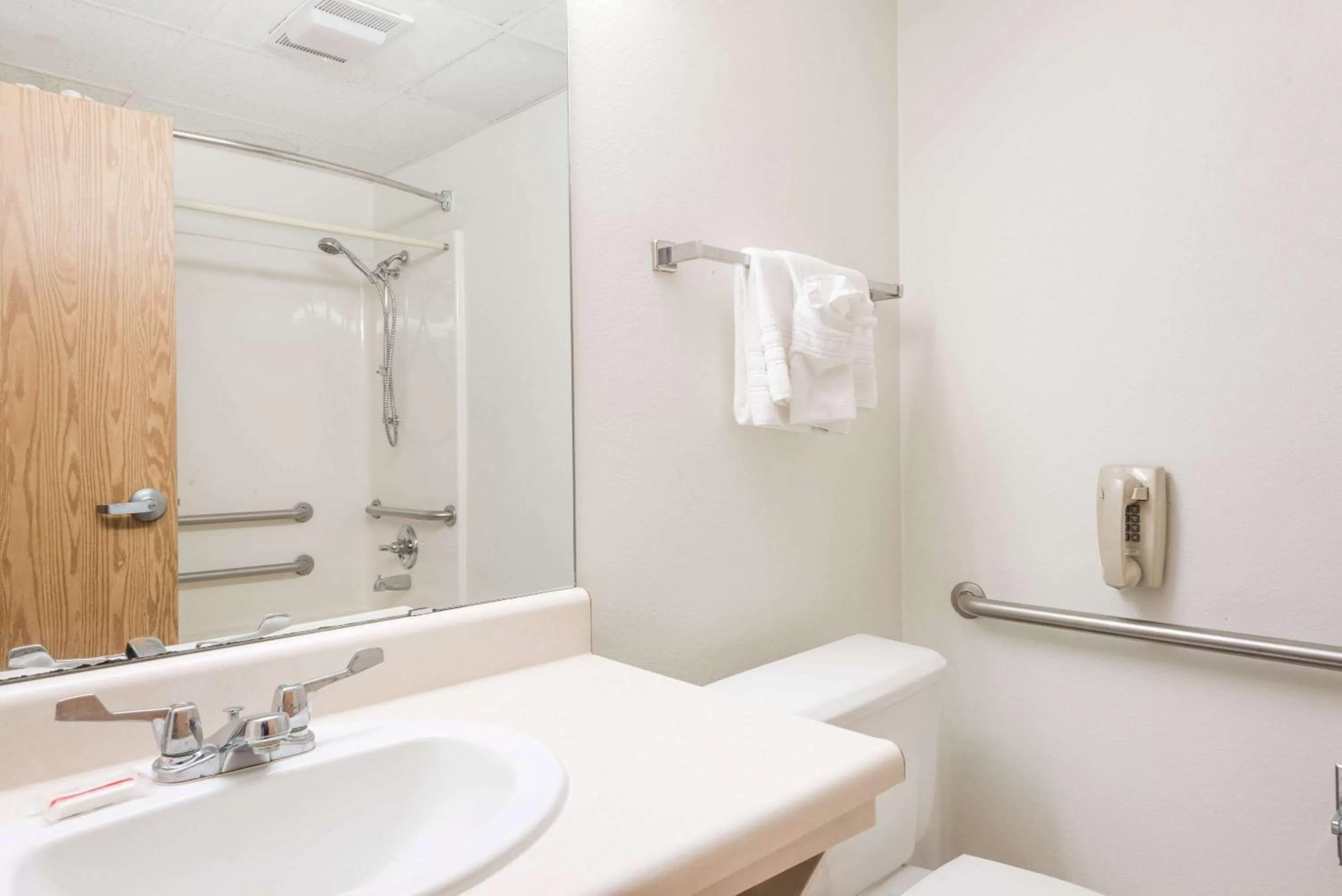 Bathroom in Super 8 by Wyndham Independence KS