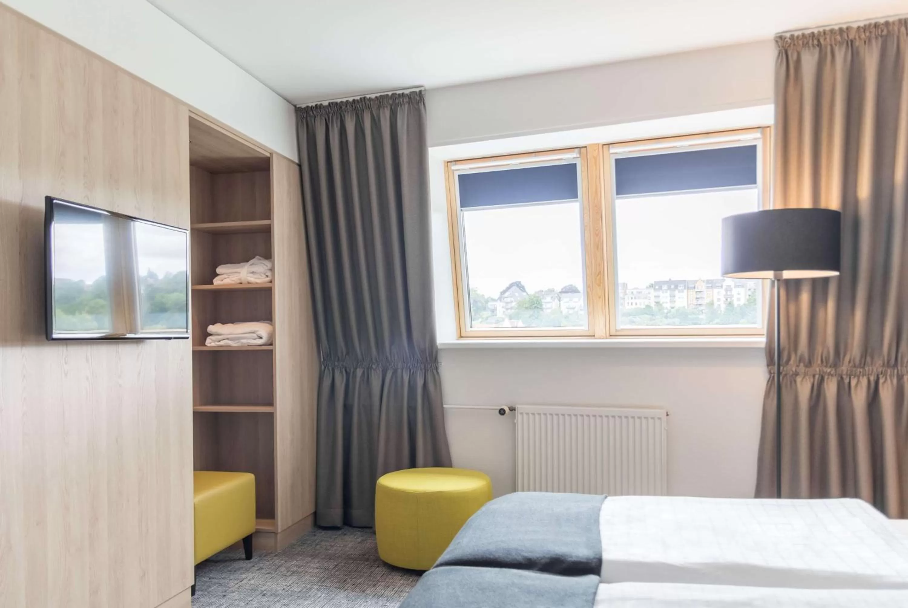Photo of the whole room, Bed in Ramada by Wyndham Flensburg City