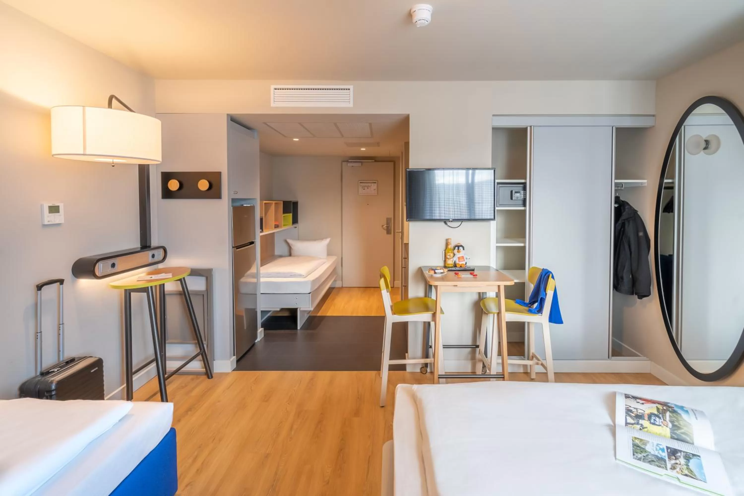 Living room, Bed in Aparthotel Adagio Access Freiburg