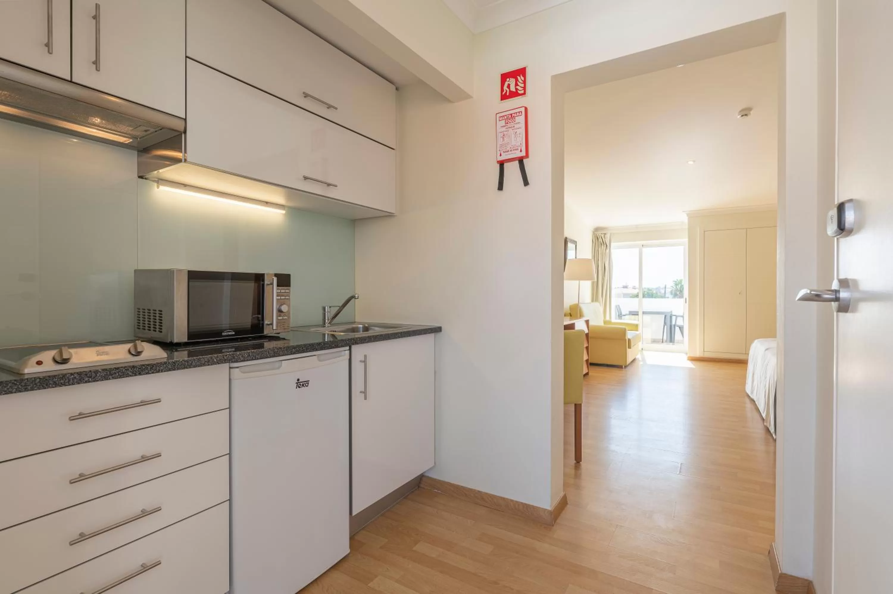 Kitchen or kitchenette in Lagoa Hotel