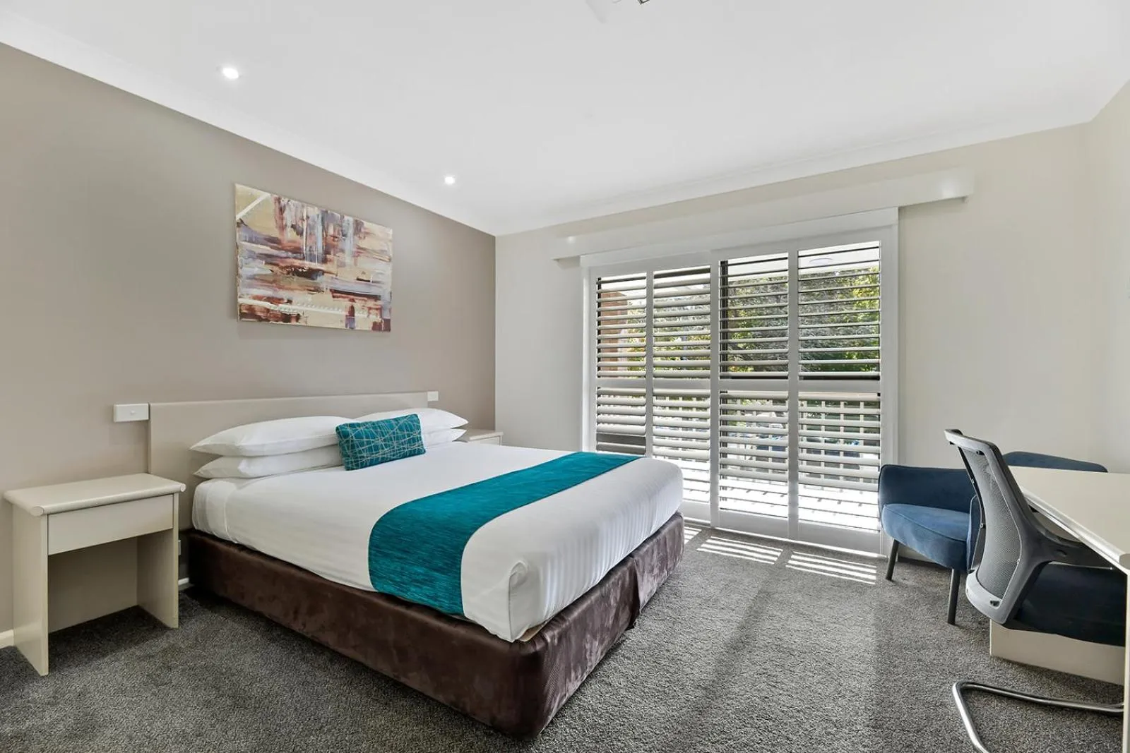 Bed in Central Caleula Motor Lodge