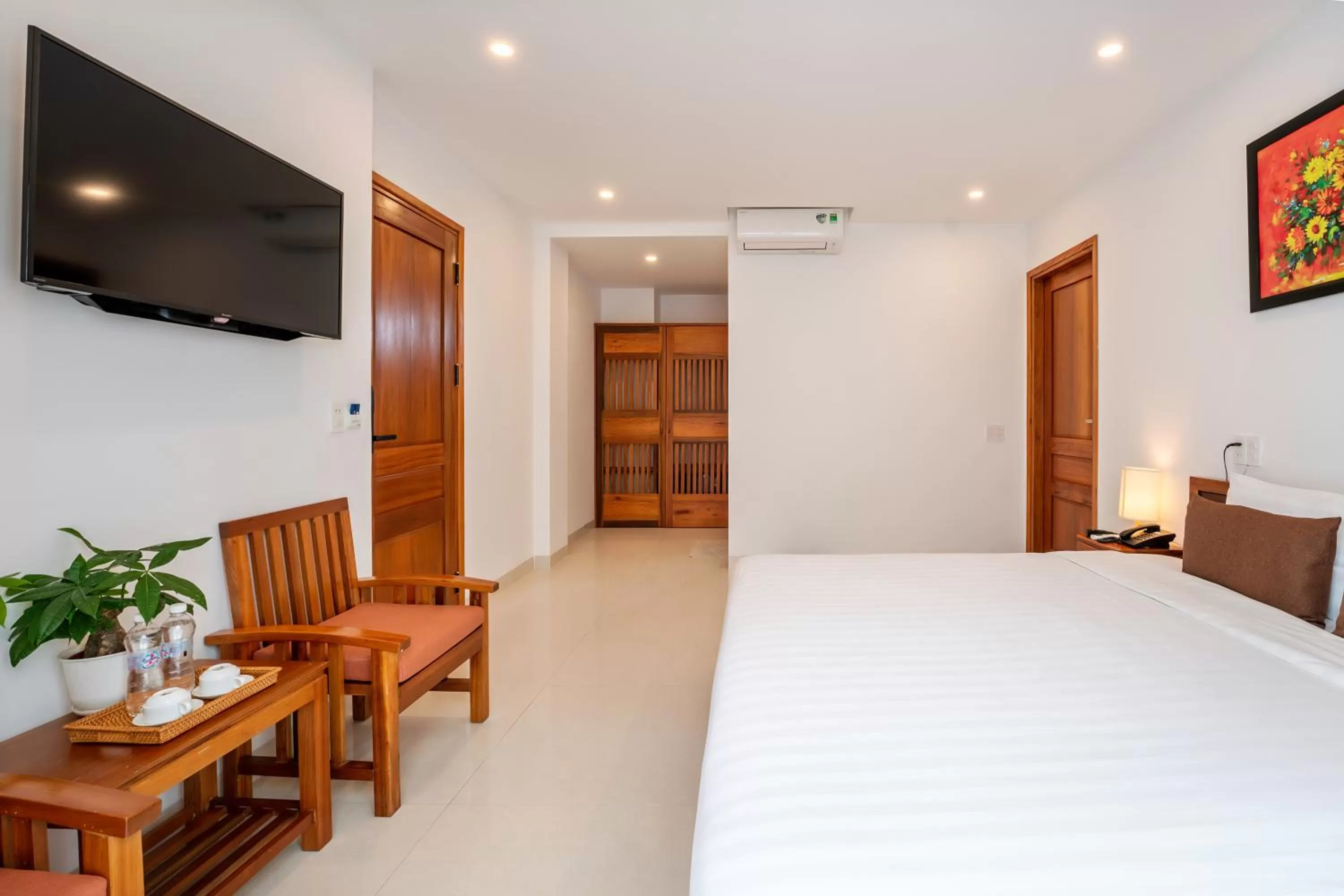 Bed, TV/Entertainment Center in Tomorrow Oasis Boutique Villa Hoi An