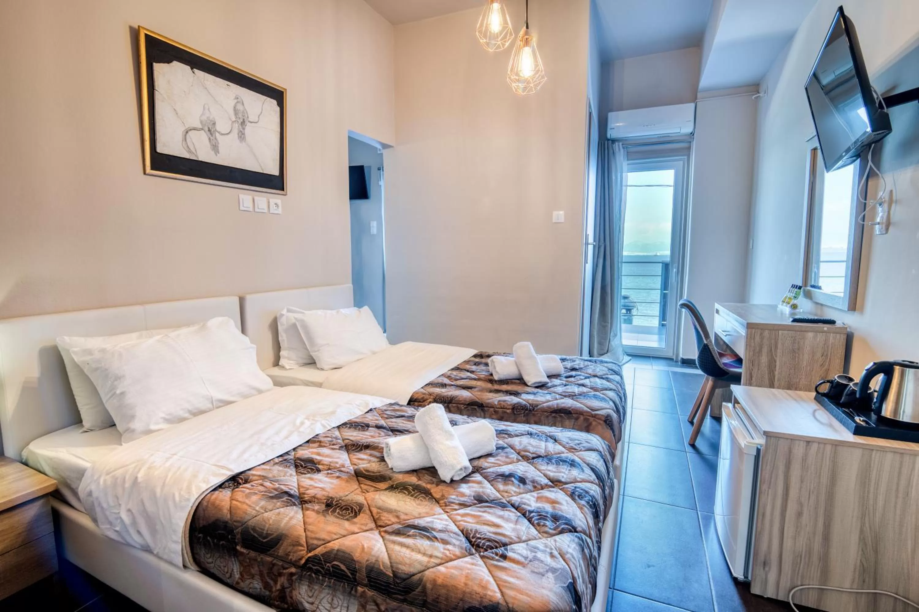Bed in Votsalakia Hotel & Luxury Apartments