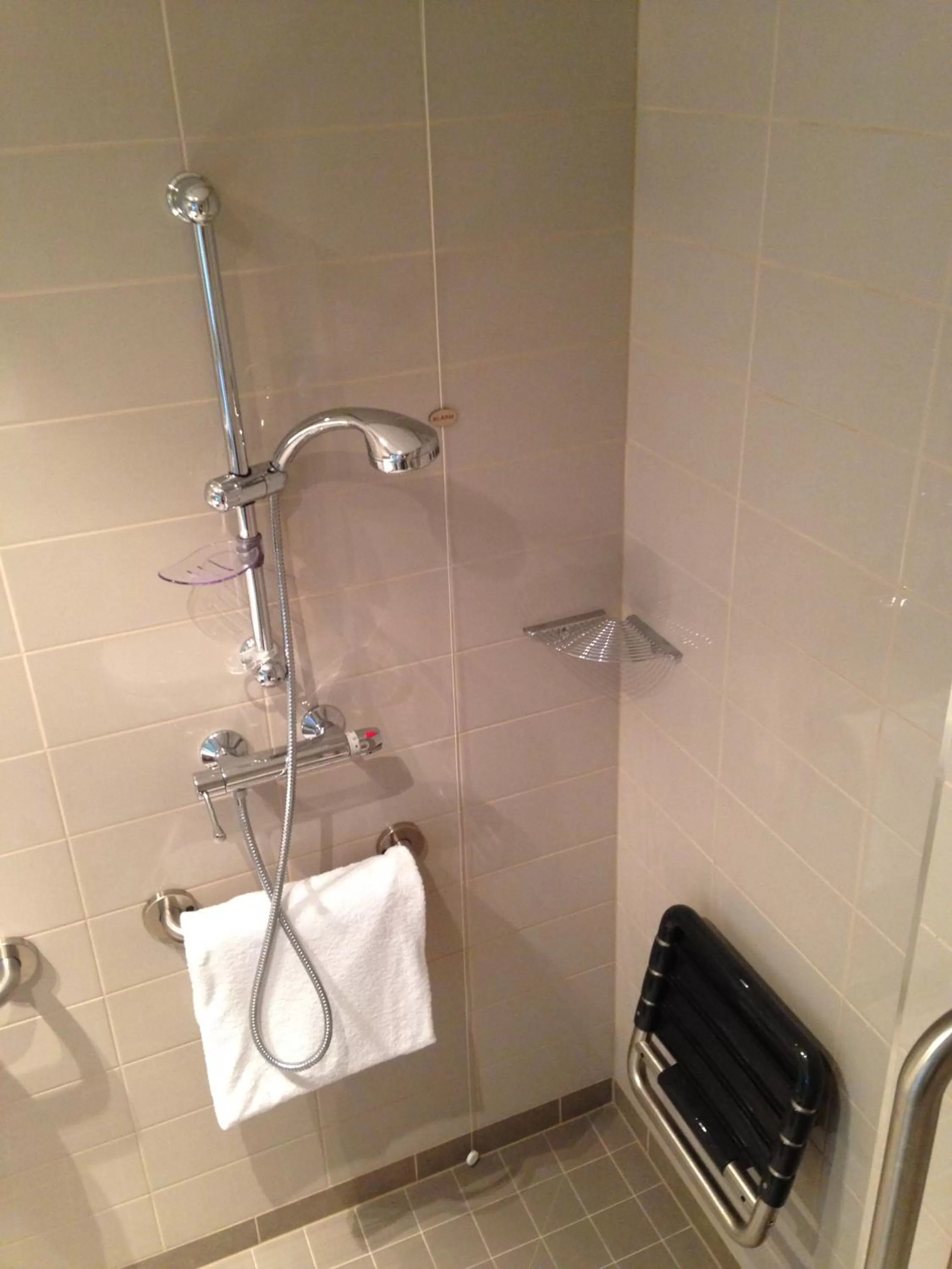 Bathroom in Crowne Plaza Verona Fiera by IHG