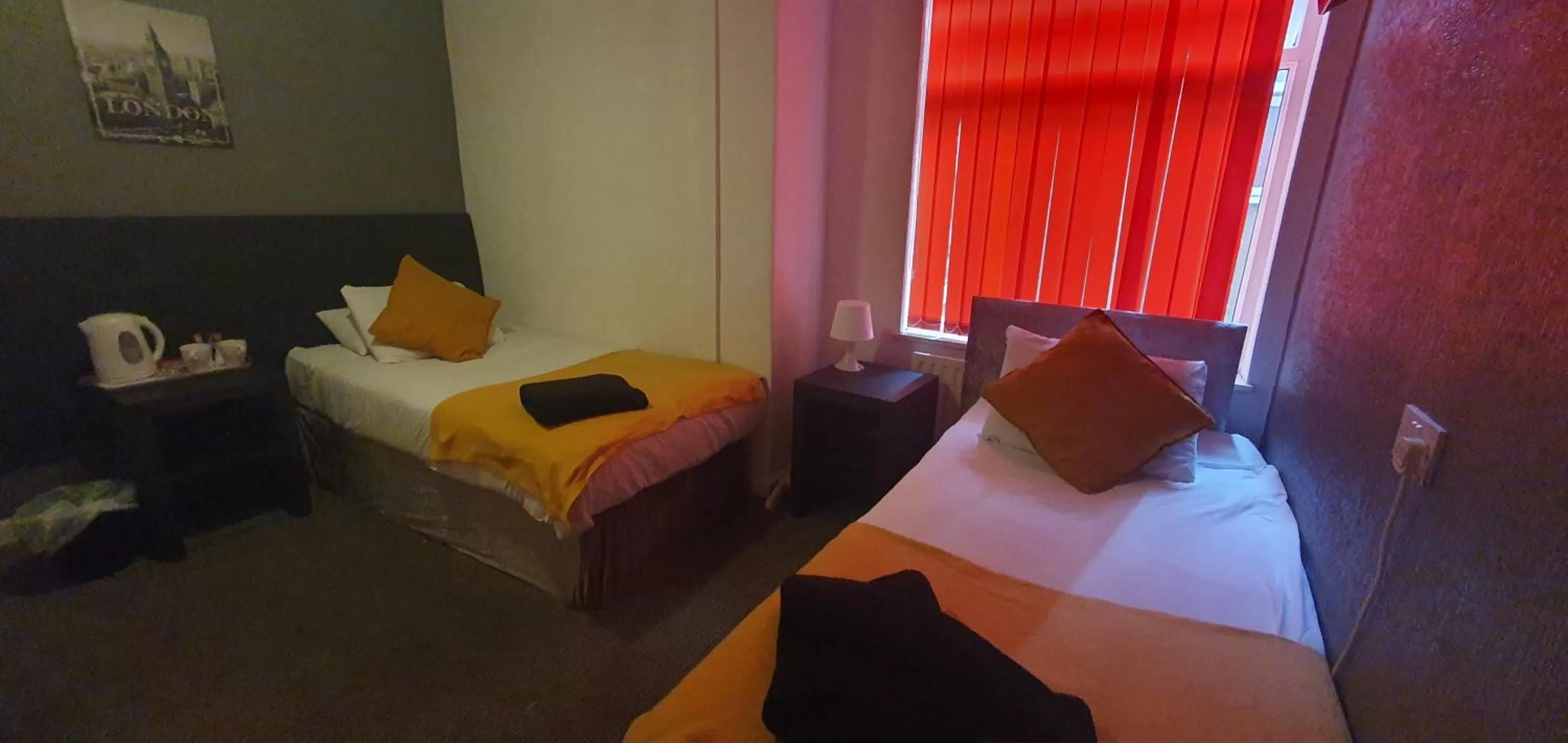 Bed in Palm Beach Hotel by the Sea