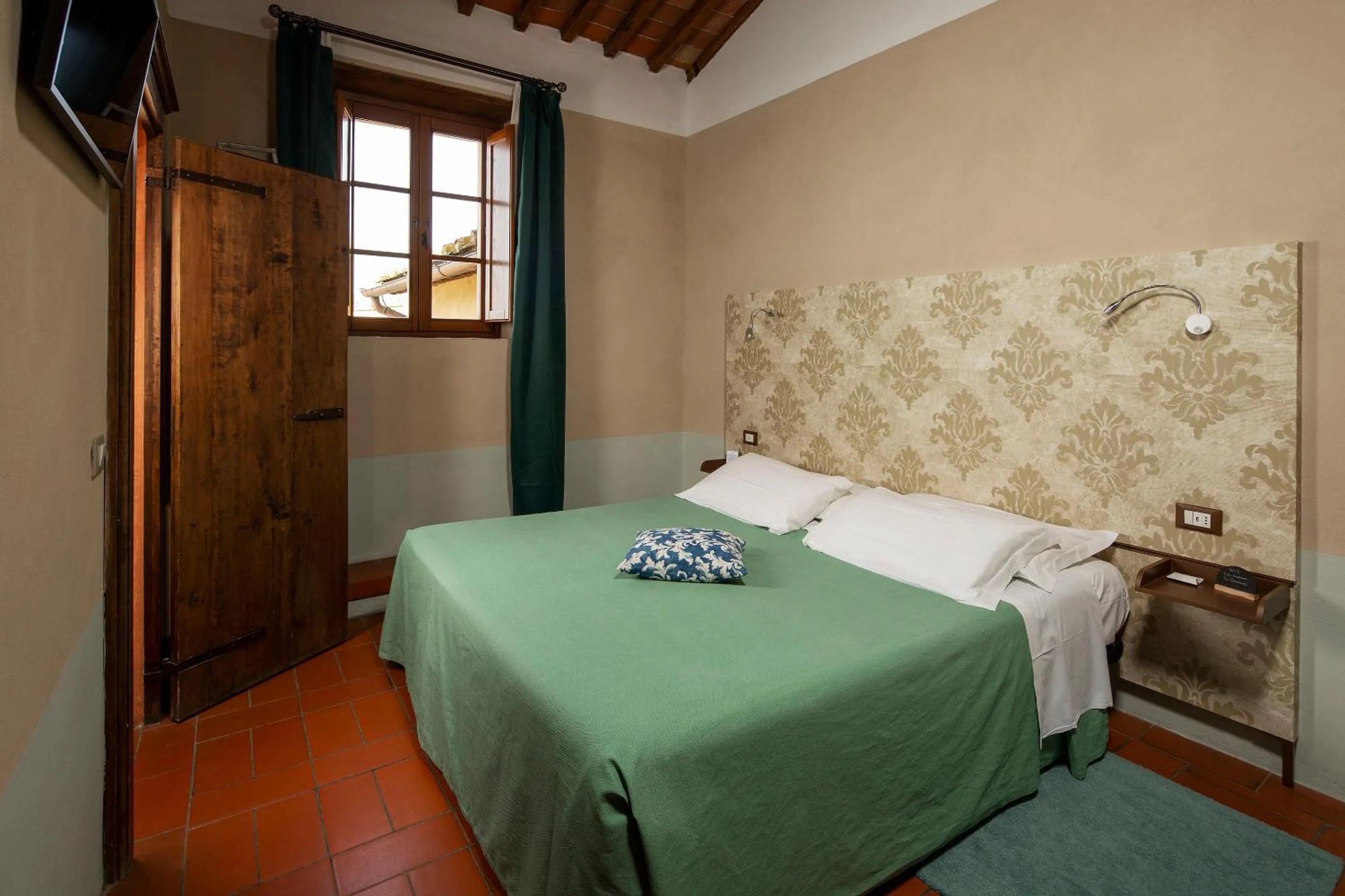 Bed in Hotel Le Capanne