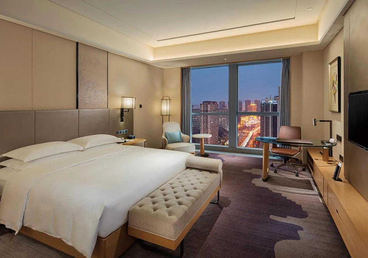 Living room, Bed in Hilton Chengdu Longquanyi