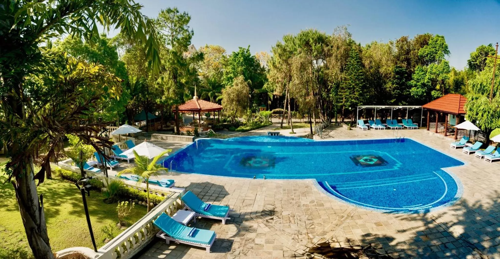 Swimming pool in Park Village Resort by KGH Group