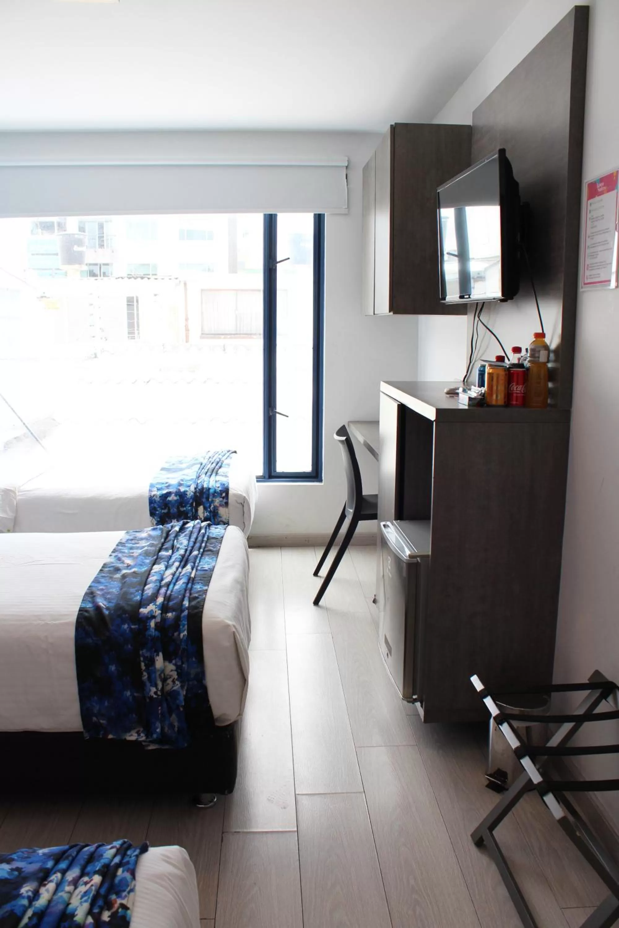 Bed, Seating Area in Agora Suites Self-Service Boutique Hotel