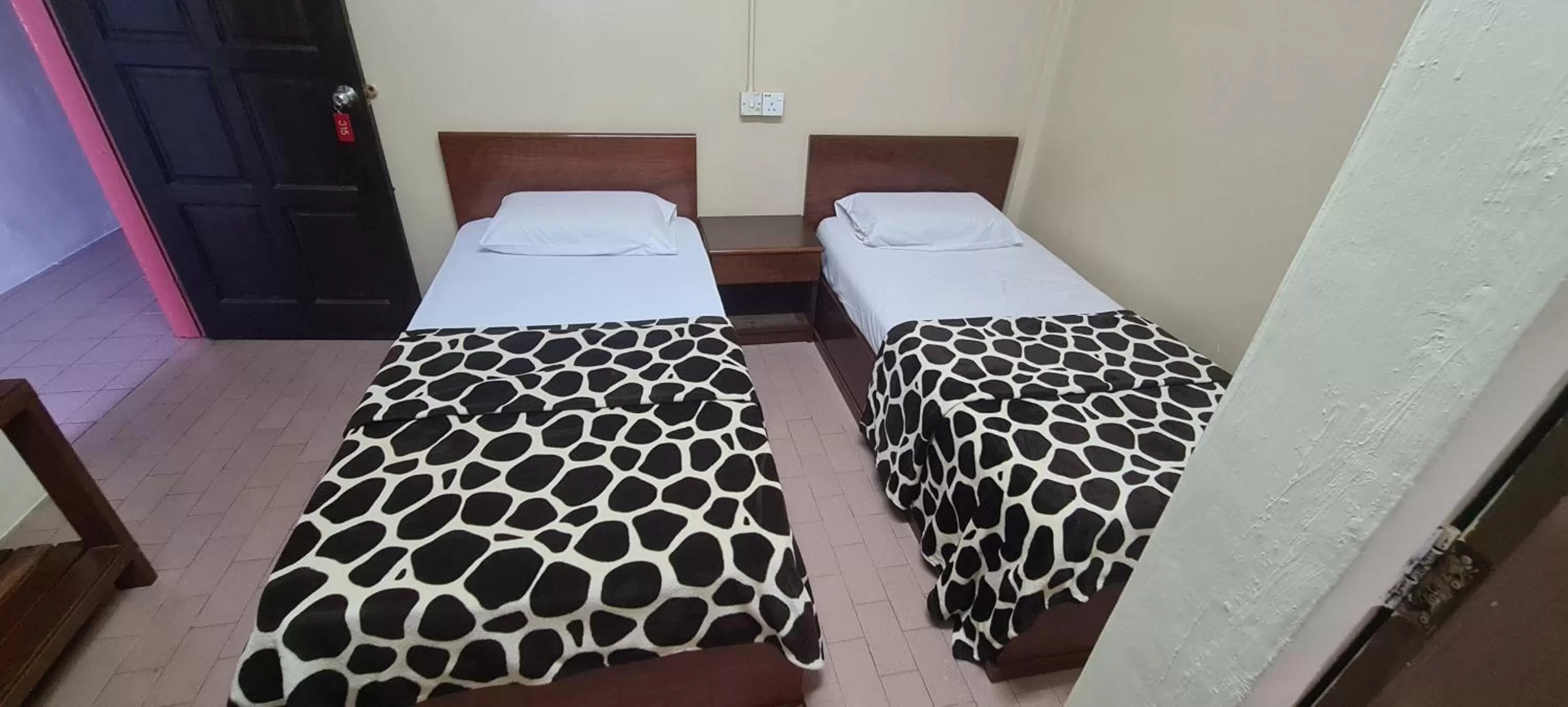 Bed in East Coast Hotel