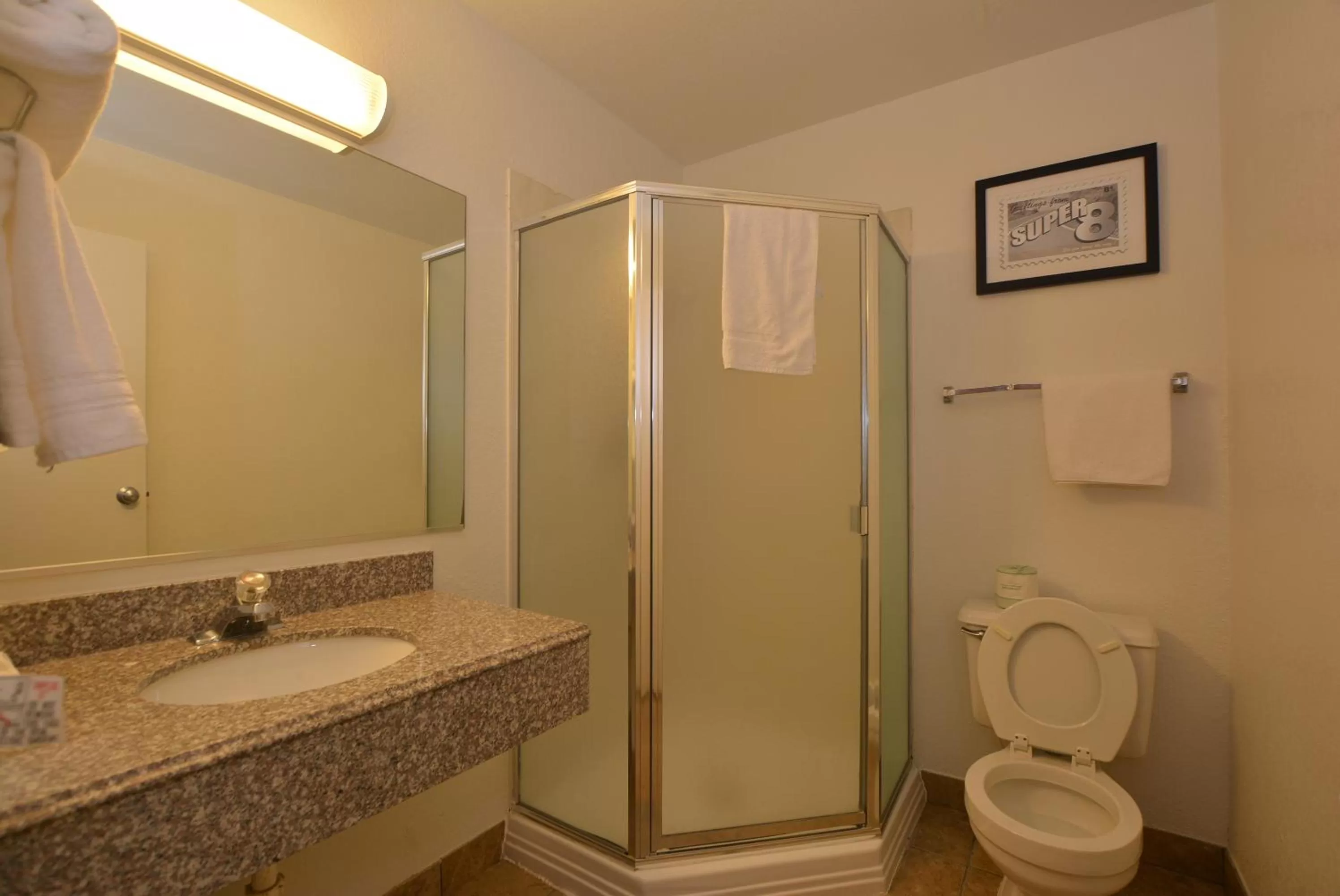 Bathroom in Super 8 by Wyndham Midwest City OK