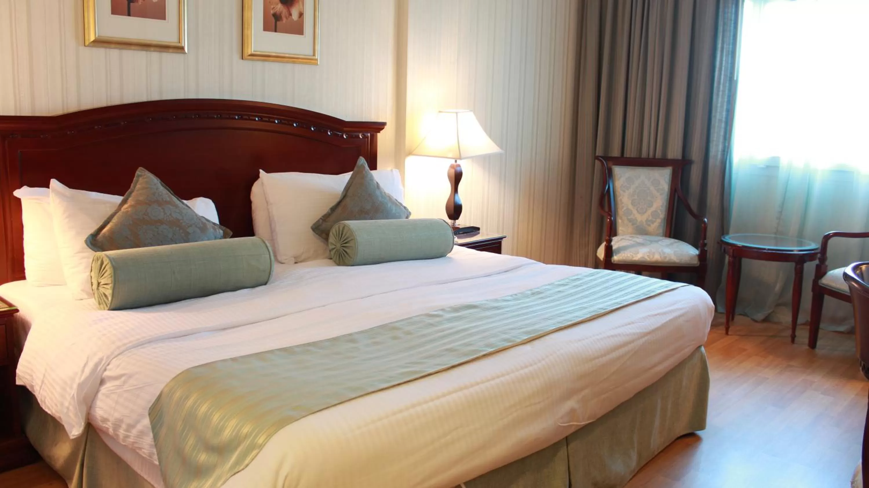 Bed in Swiss Al Hamra Hotel