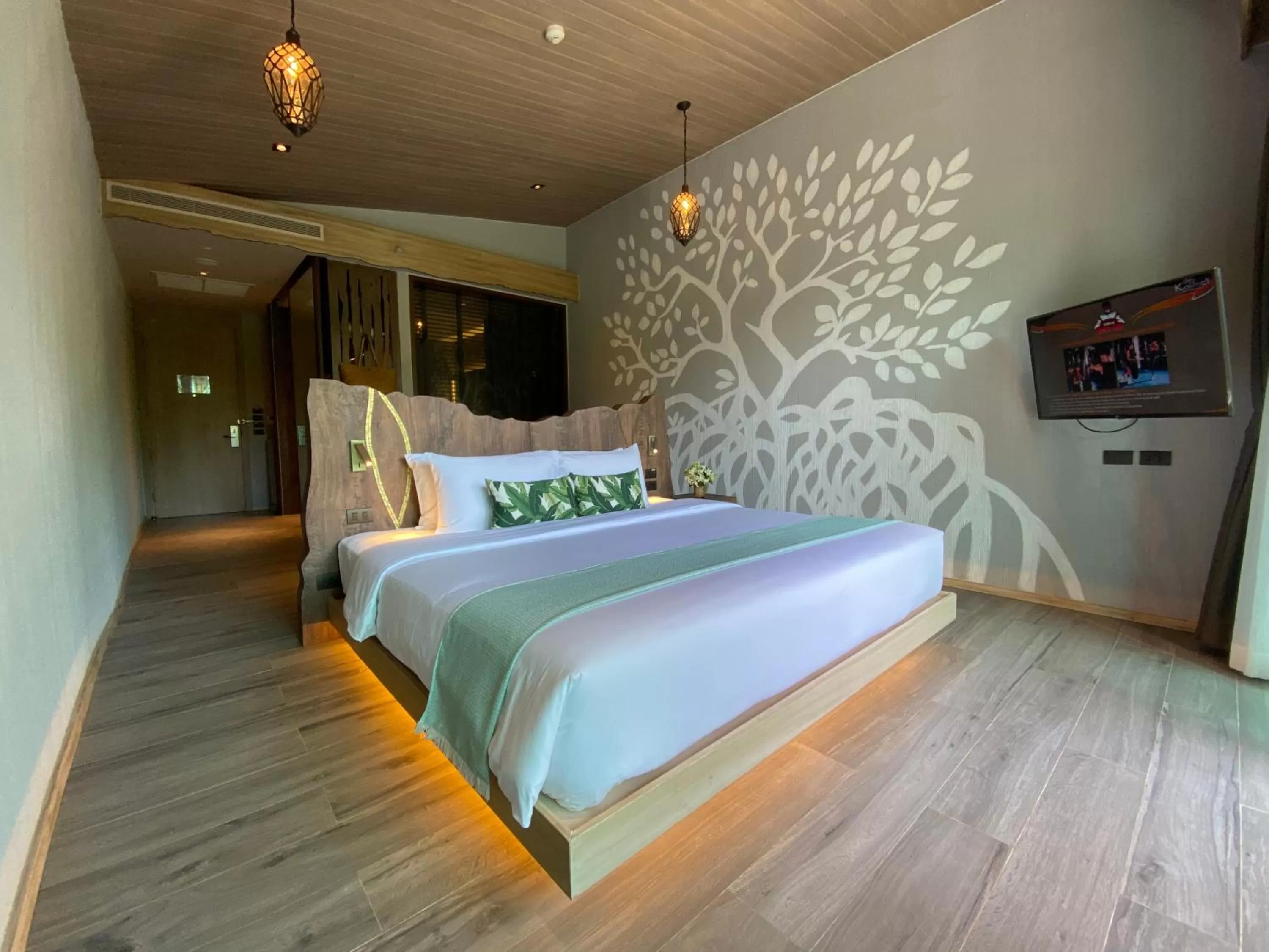 Bed in Kalima Resort and Villas Khao Lak