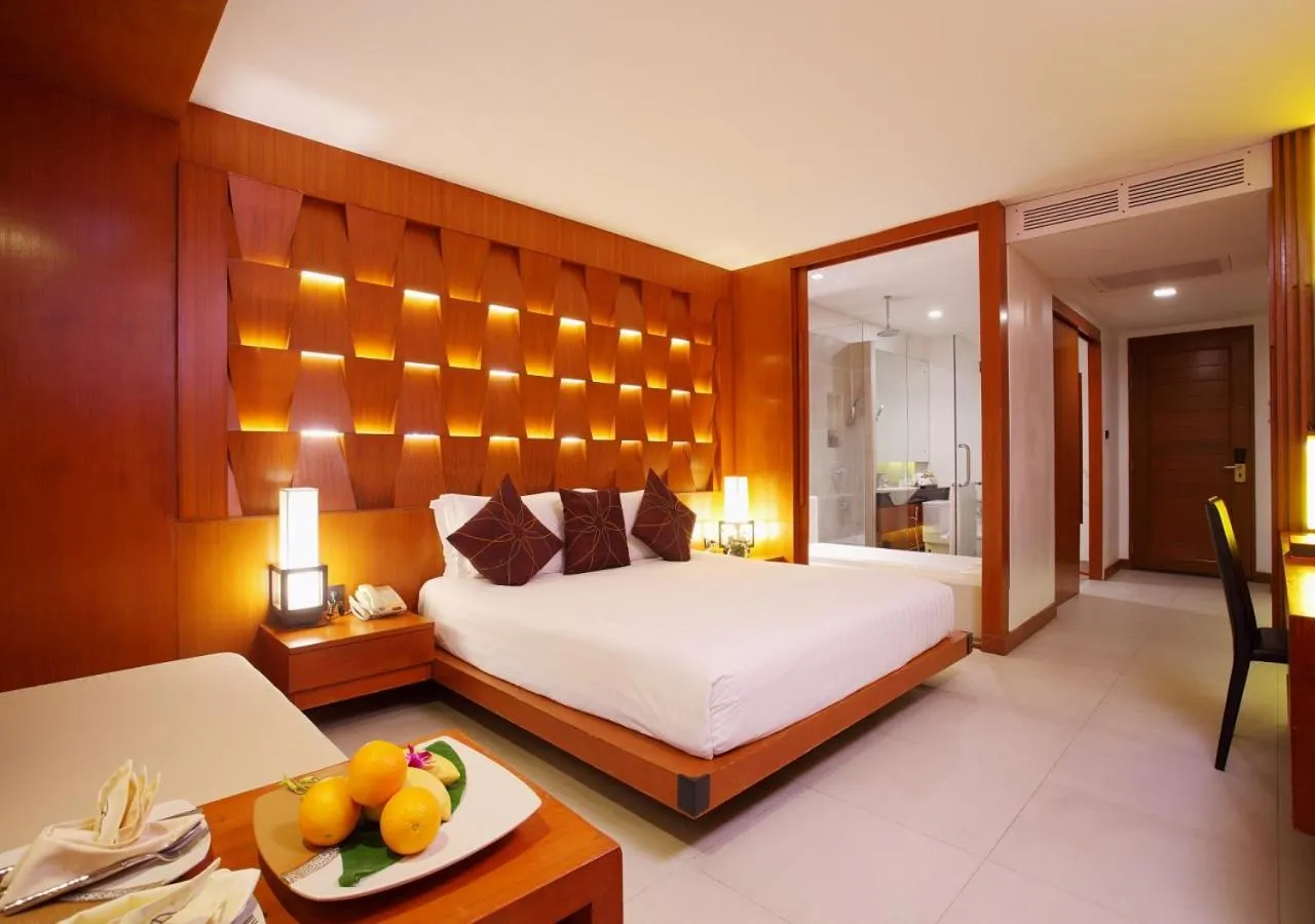 Bed in La Flora Resort Patong