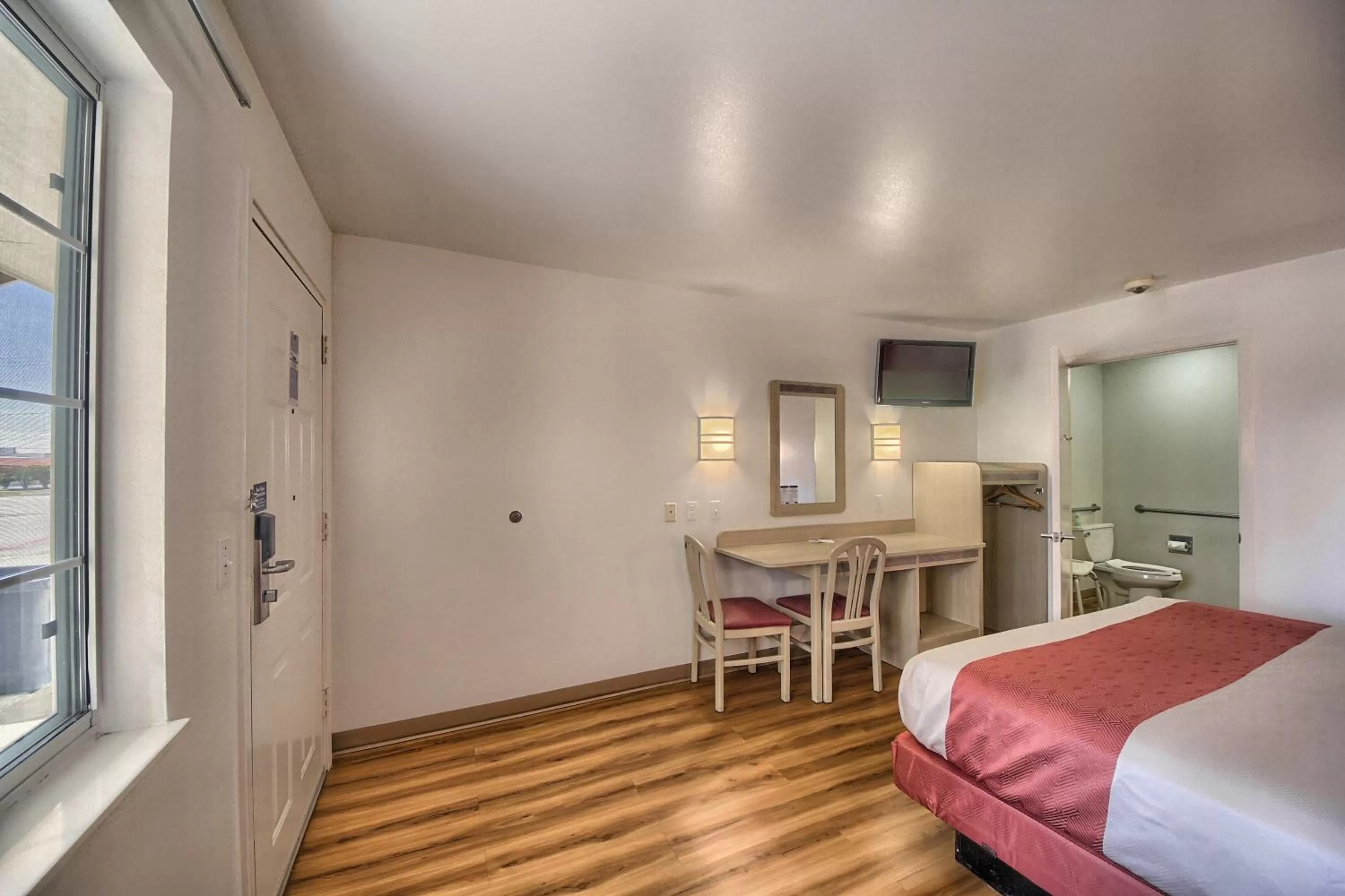 Toilet, Bed in Motel 6-Kerrville, TX