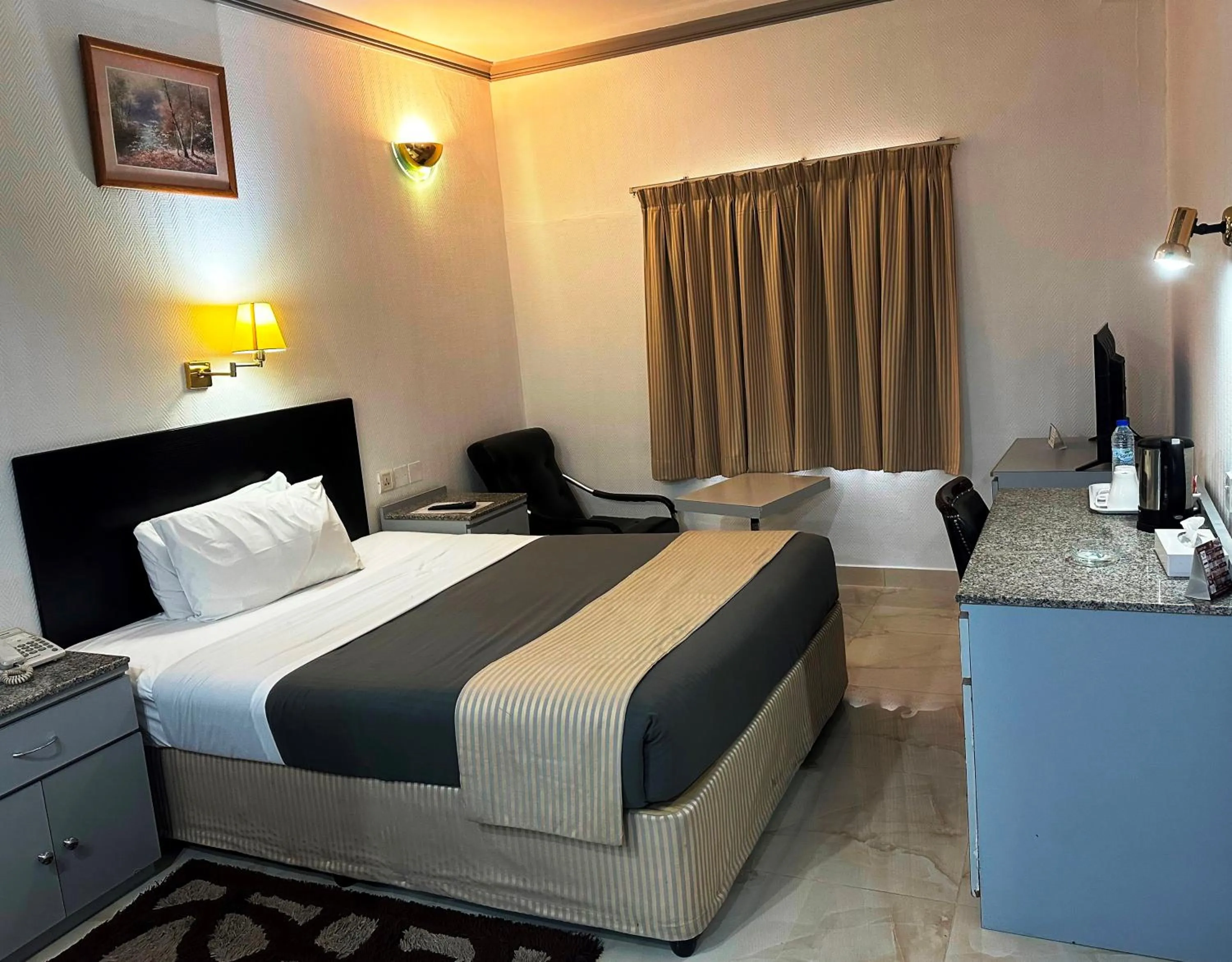 Bed in Grand Astoria Hotel