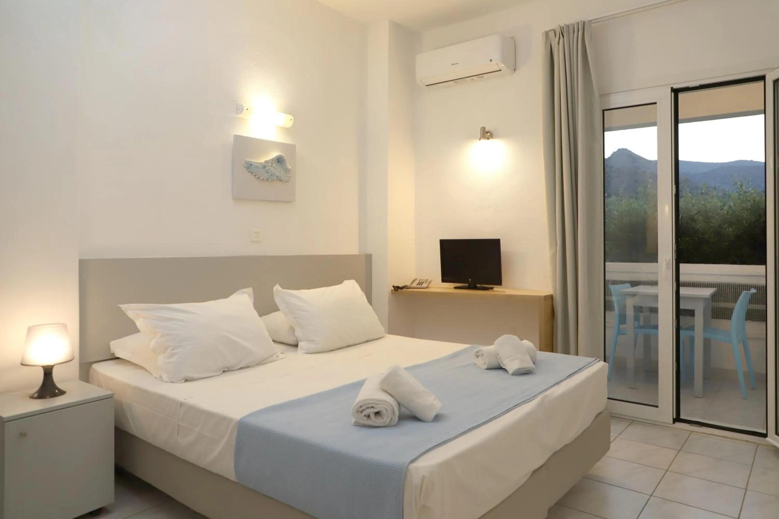 Photo of the whole room, Bed in Elounda Krini Hotel