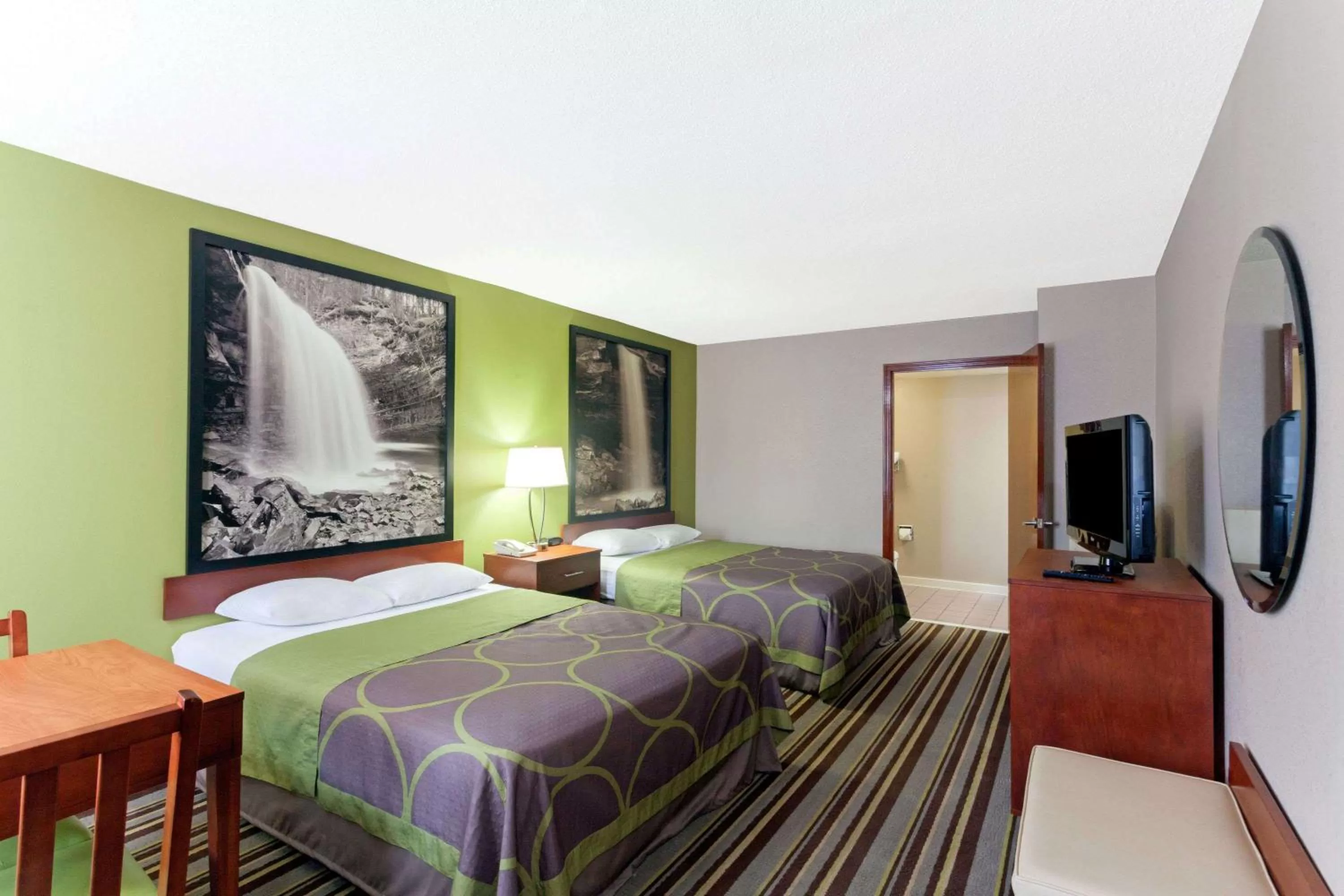 On site, Bed in Super 8 by Wyndham Clarksville Northeast