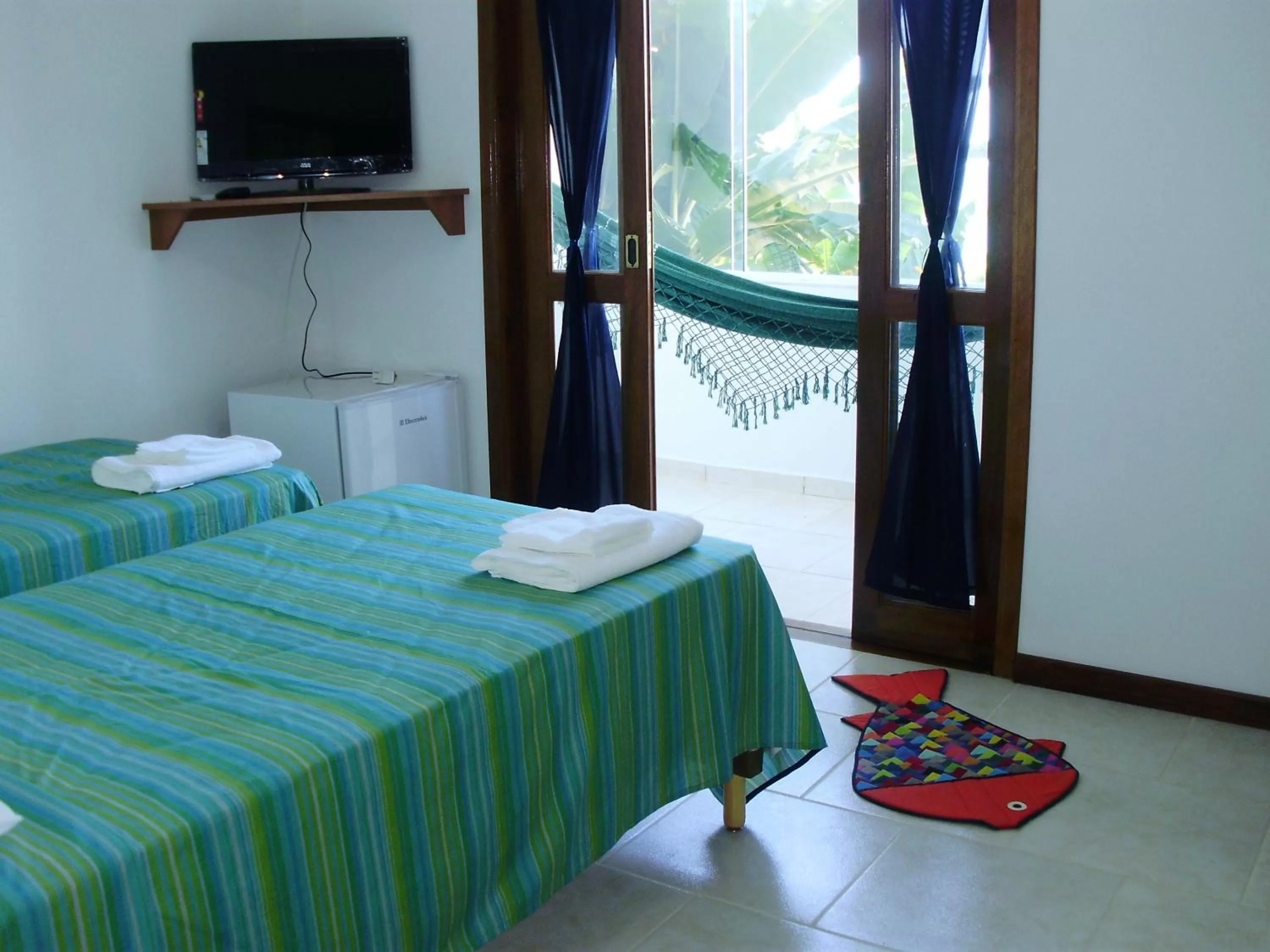 Photo of the whole room, Bed in Pousada Piquara