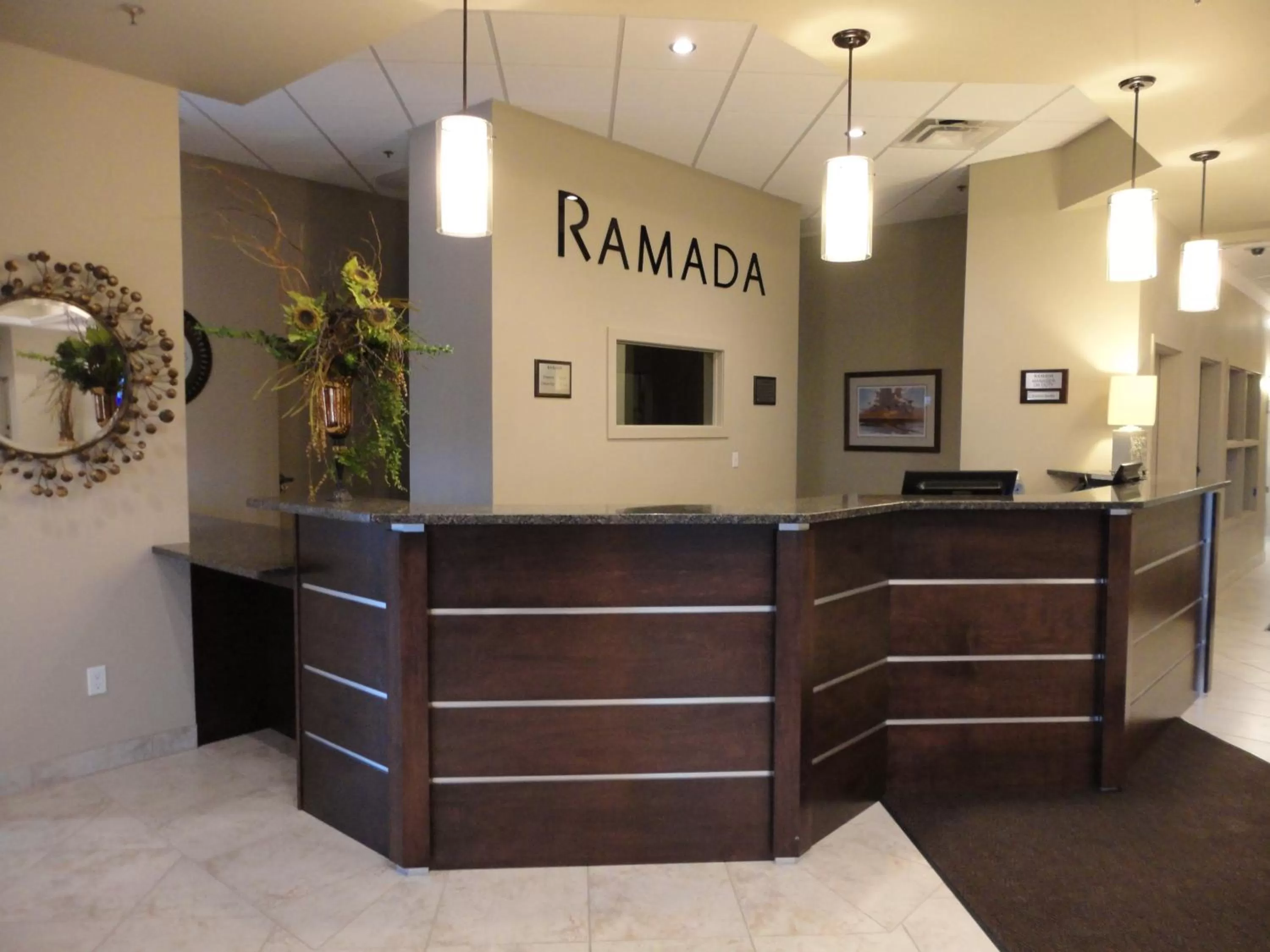 Lobby or reception in Ramada by Wyndham Emerald Park/Regina East