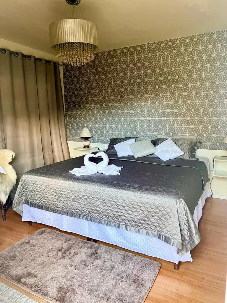 Bed in Pousada Lanai Canela