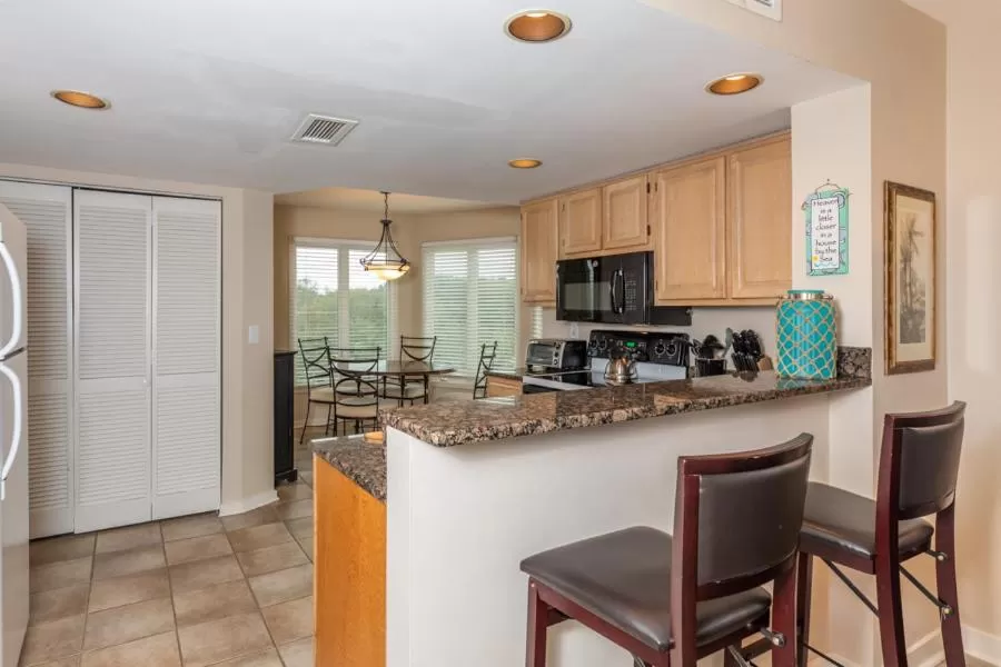 Kitchen/Kitchenette in Wild Dunes Resort - Vacation Rentals