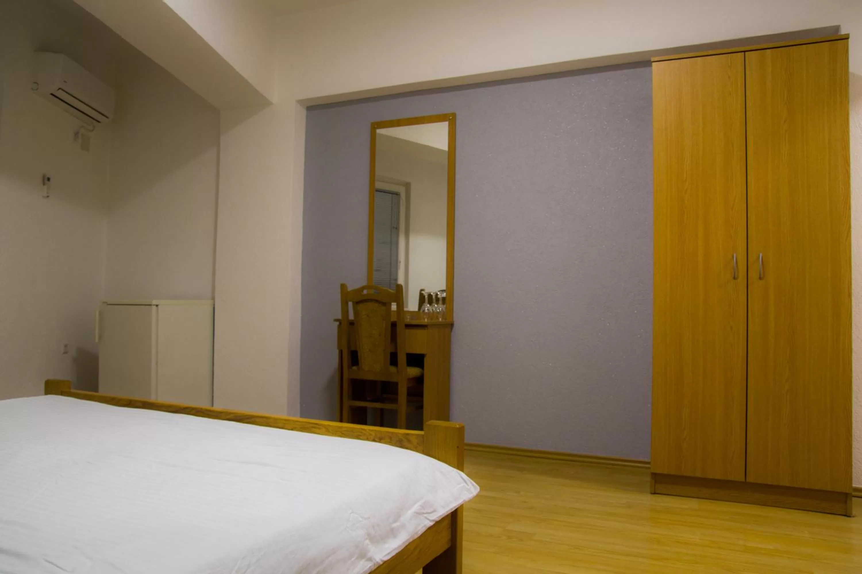 Bed in Motel Gas-Petrol