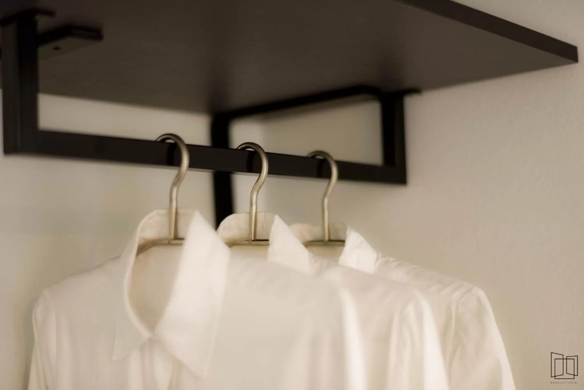 Bed in Nana City Hotel