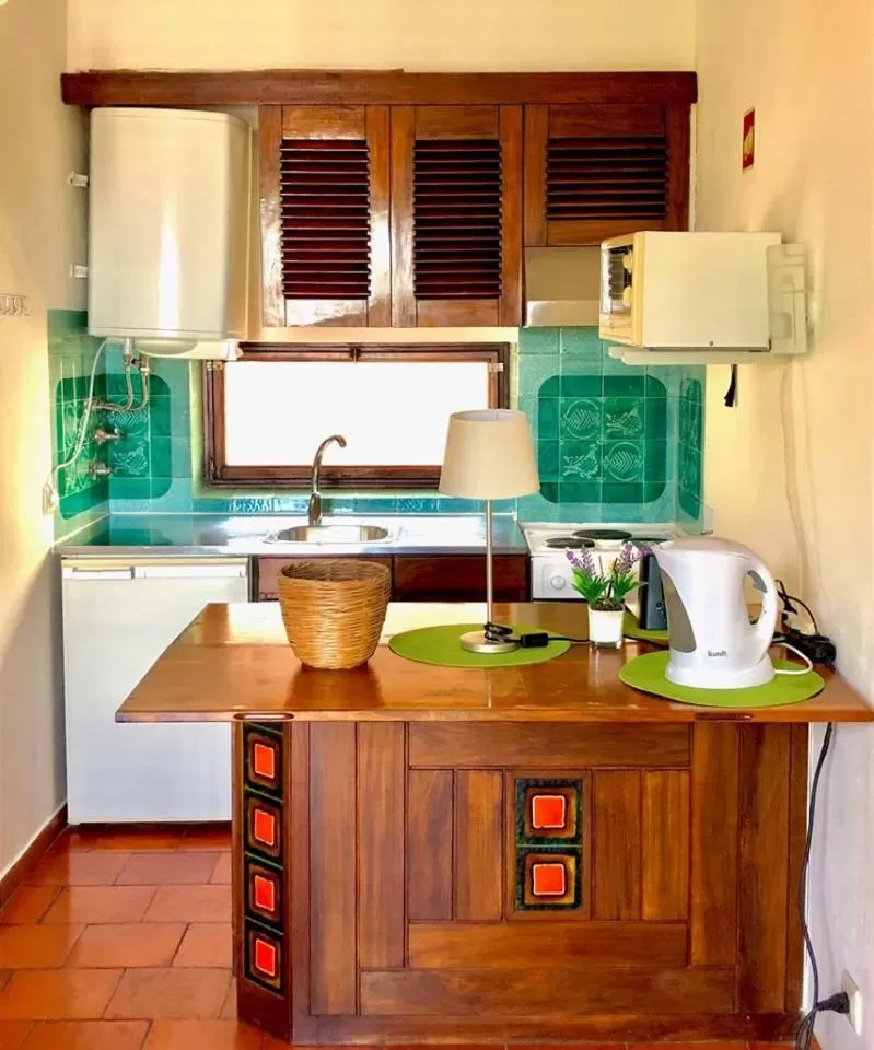 Kitchen or kitchenette in Albufeira Jardim by Umbral