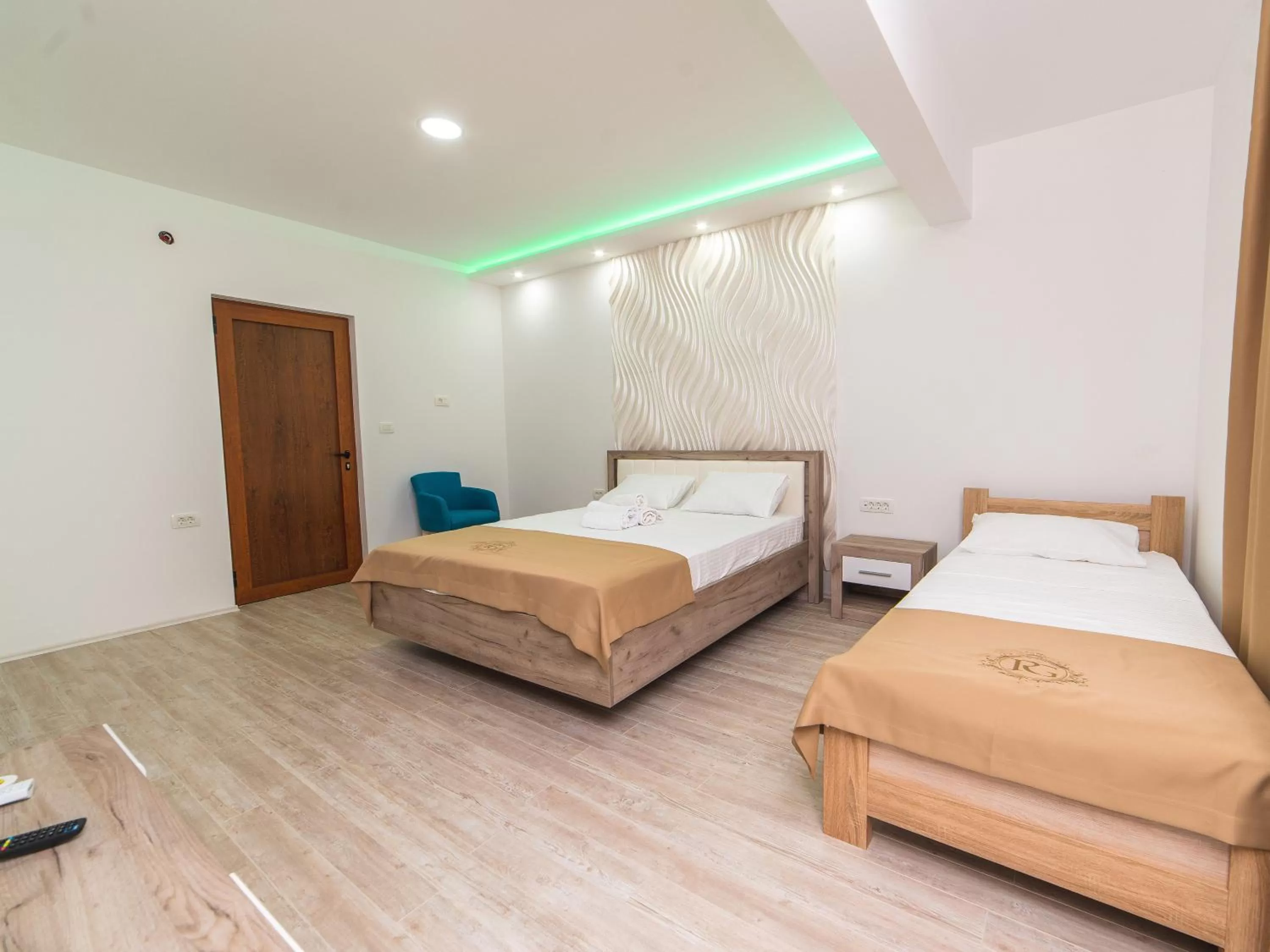 Bed in Hotel Royal Garden