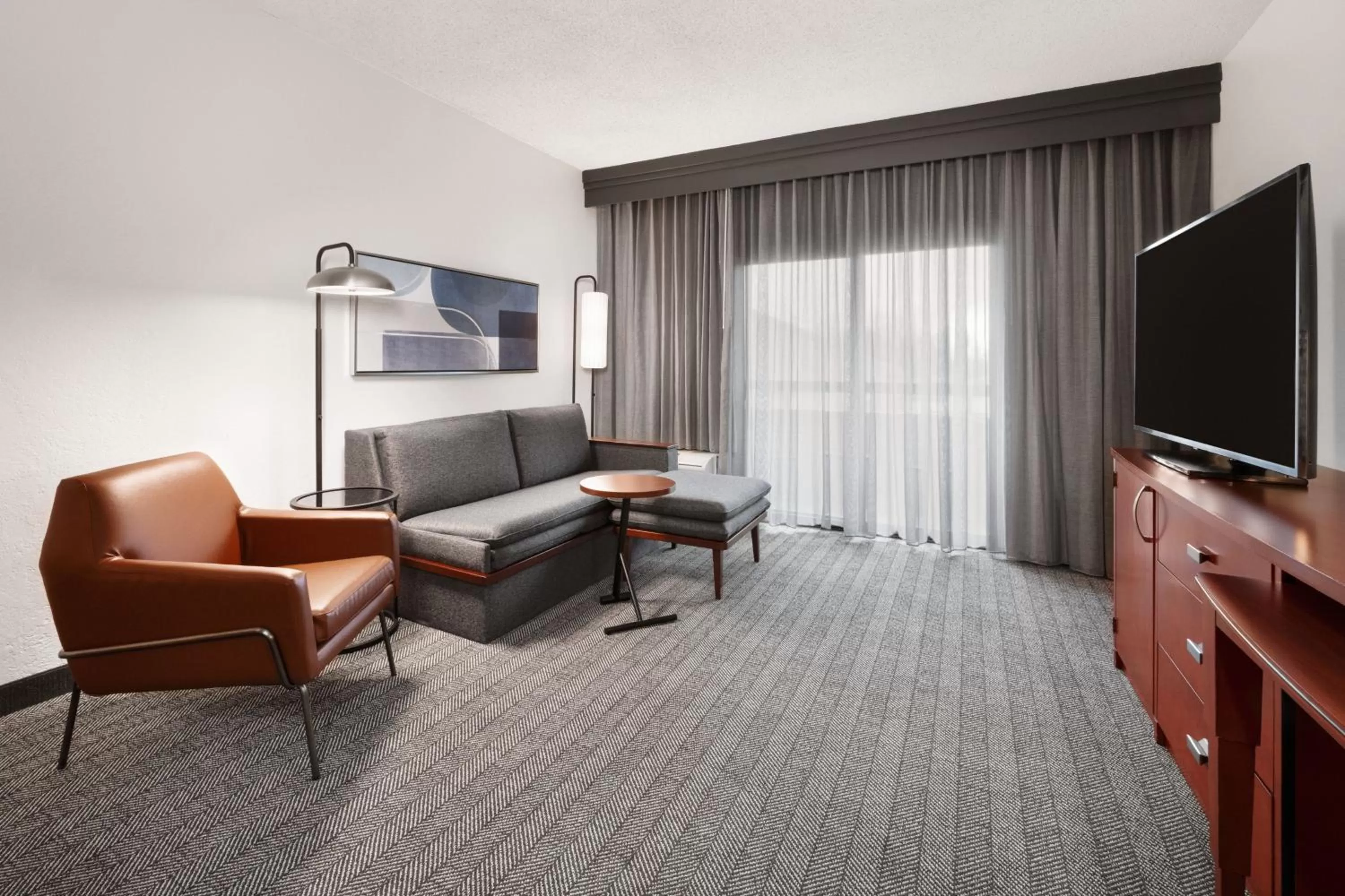 Living room in Courtyard by Marriott Memphis Airport
