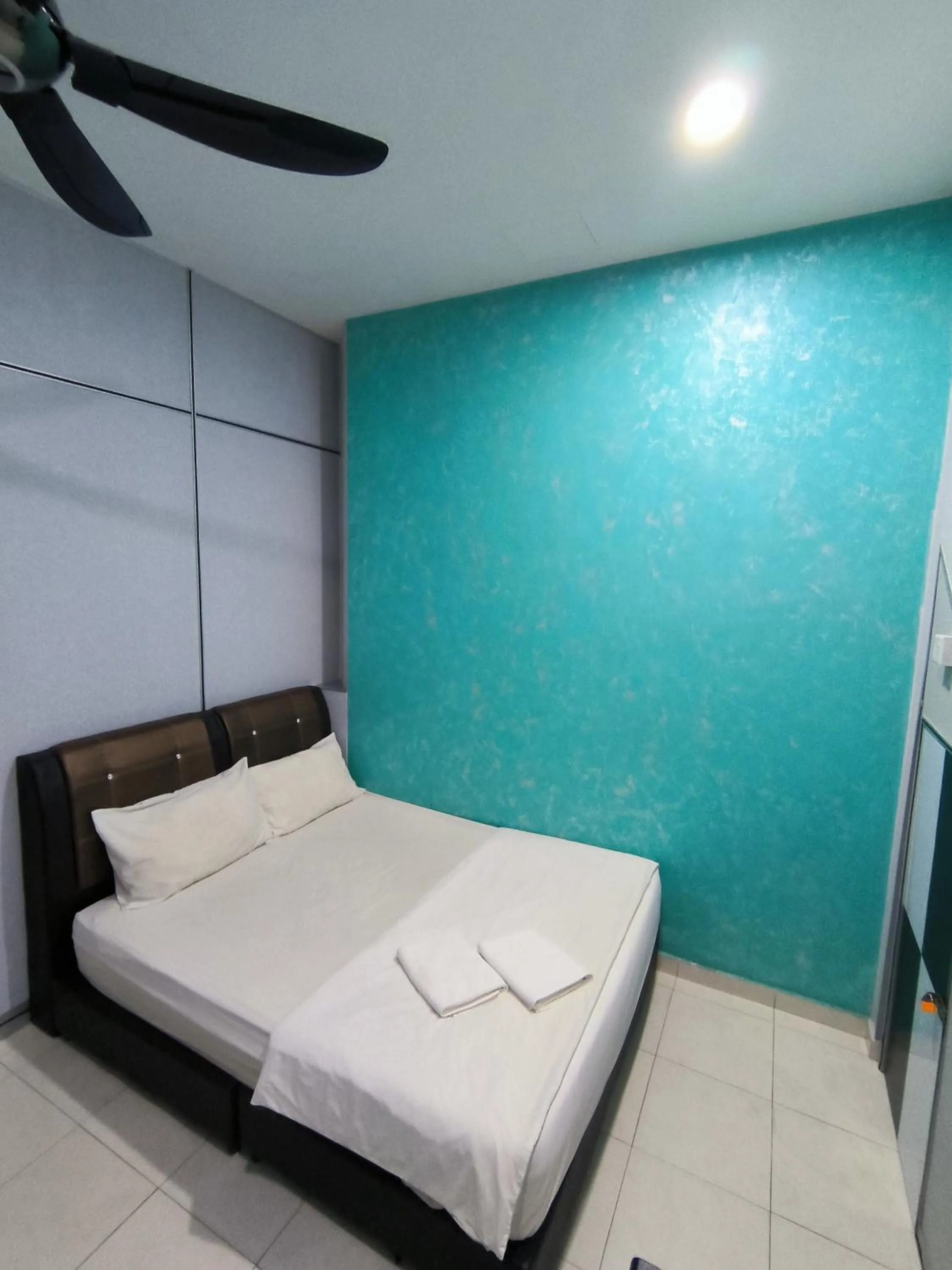 Bed in GOLDEN GUEST HOUSE KUANTAN