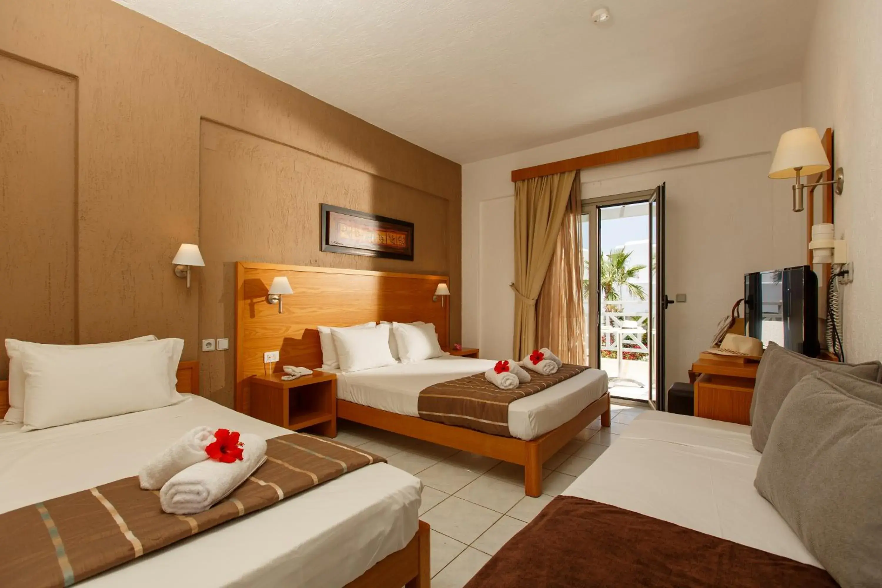 Quadruple Room with Garden View in Europa Beach Hotel & Spa Quadruple Room with Garden View in Europa Beach Hotel & Spa