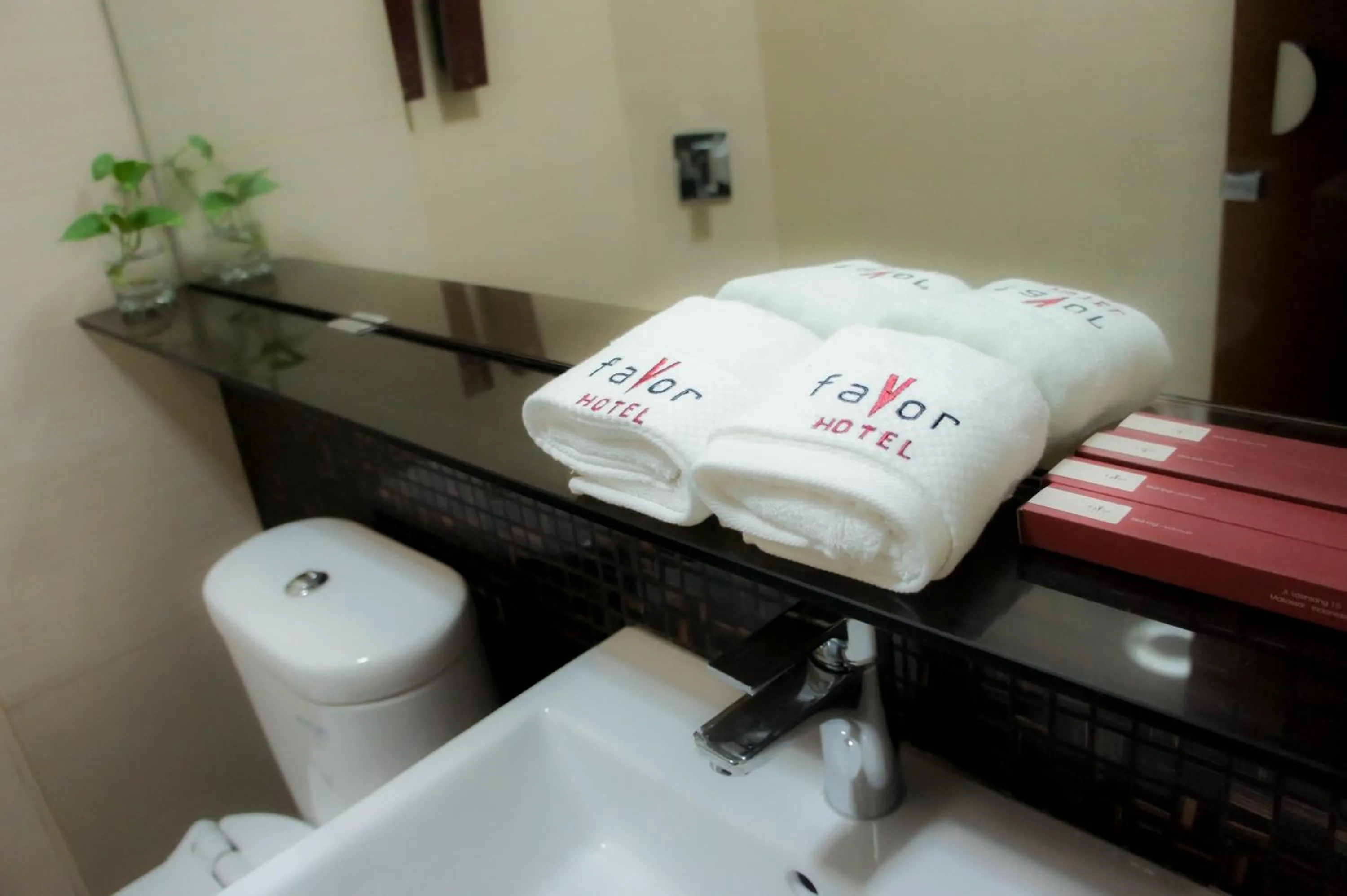 Bathroom in Favor Hotel Makassar City Center By LIFE