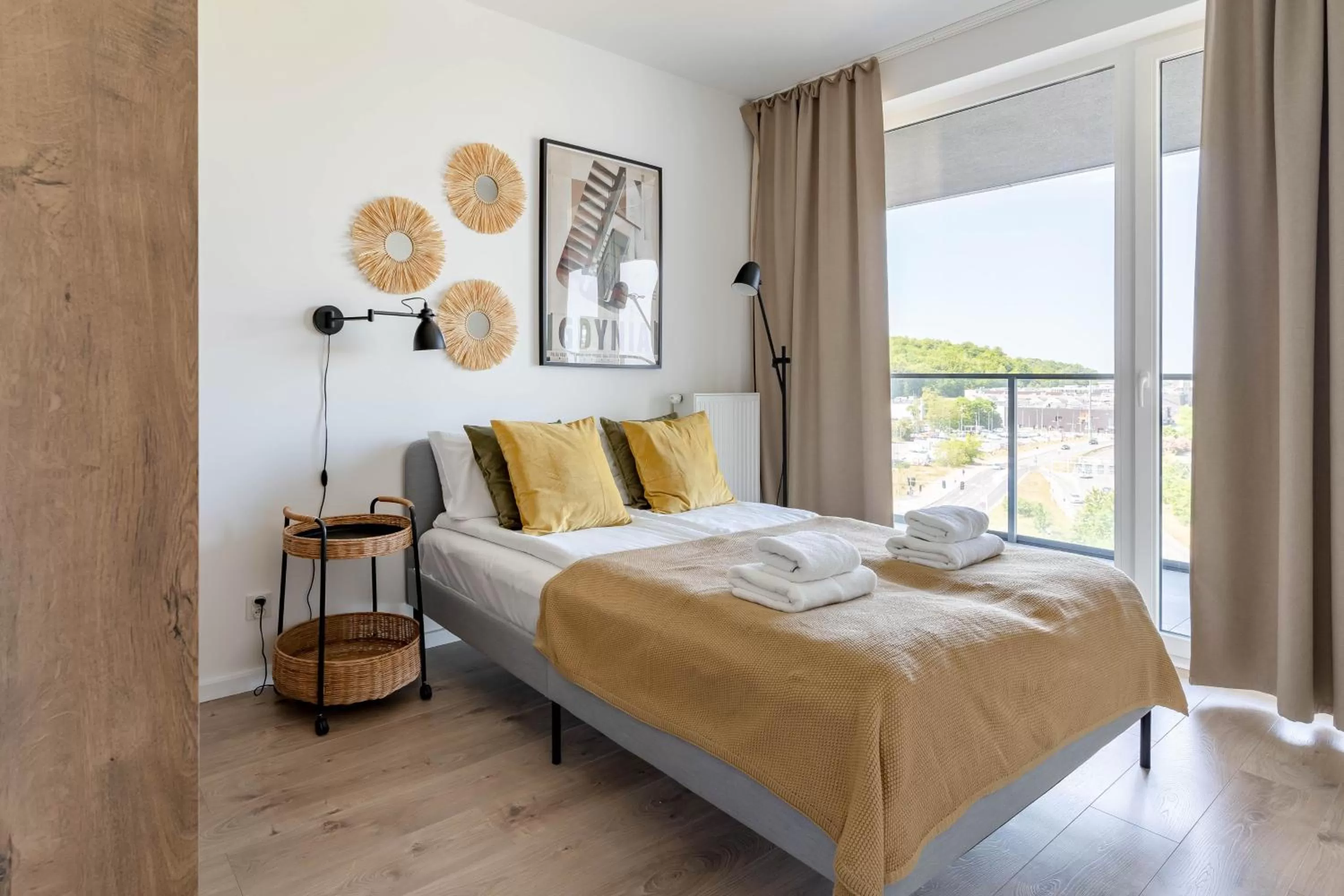 Bed in Symphony Modern Tower Apartamenty