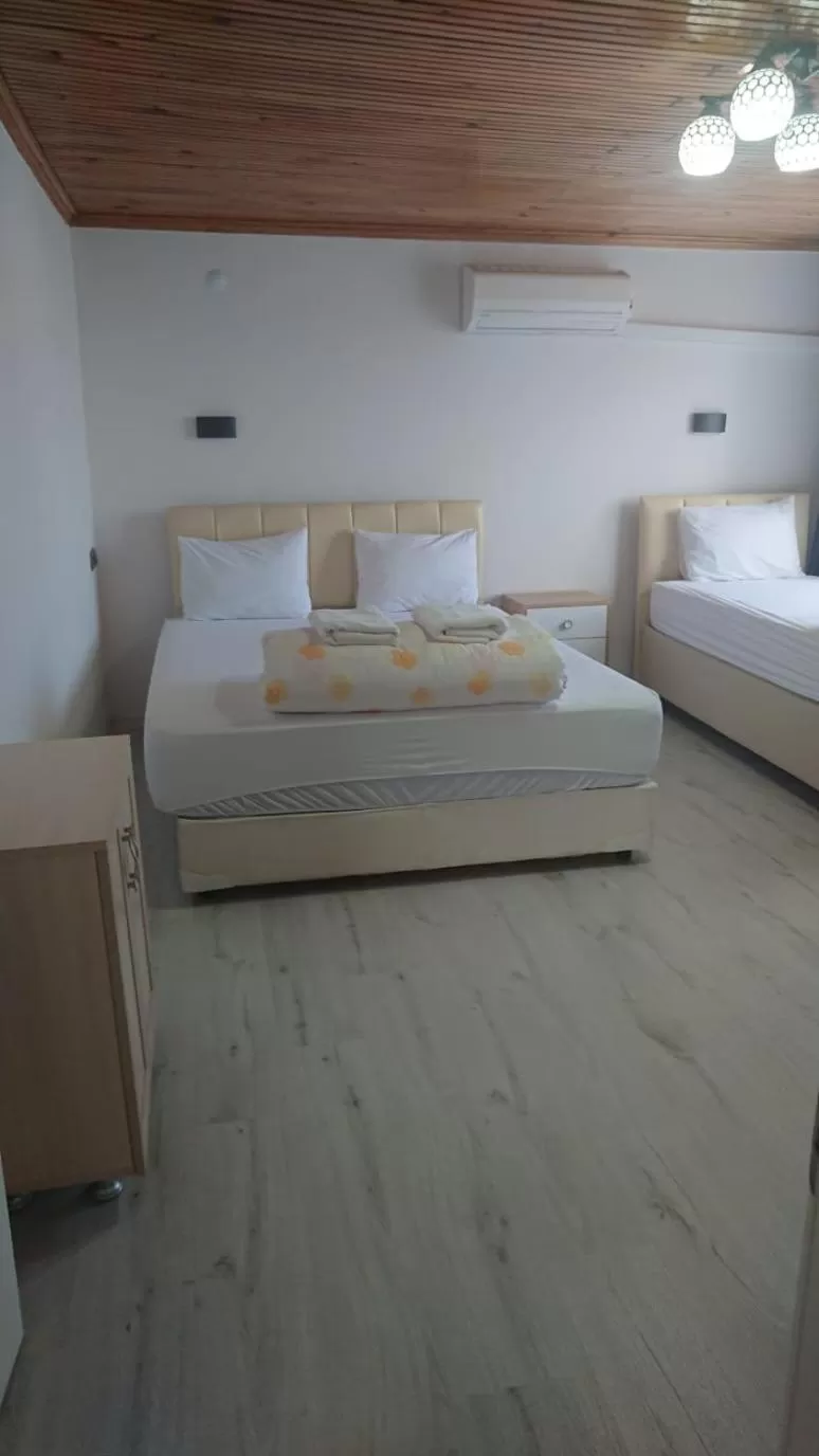 Bed in Ali's Pension