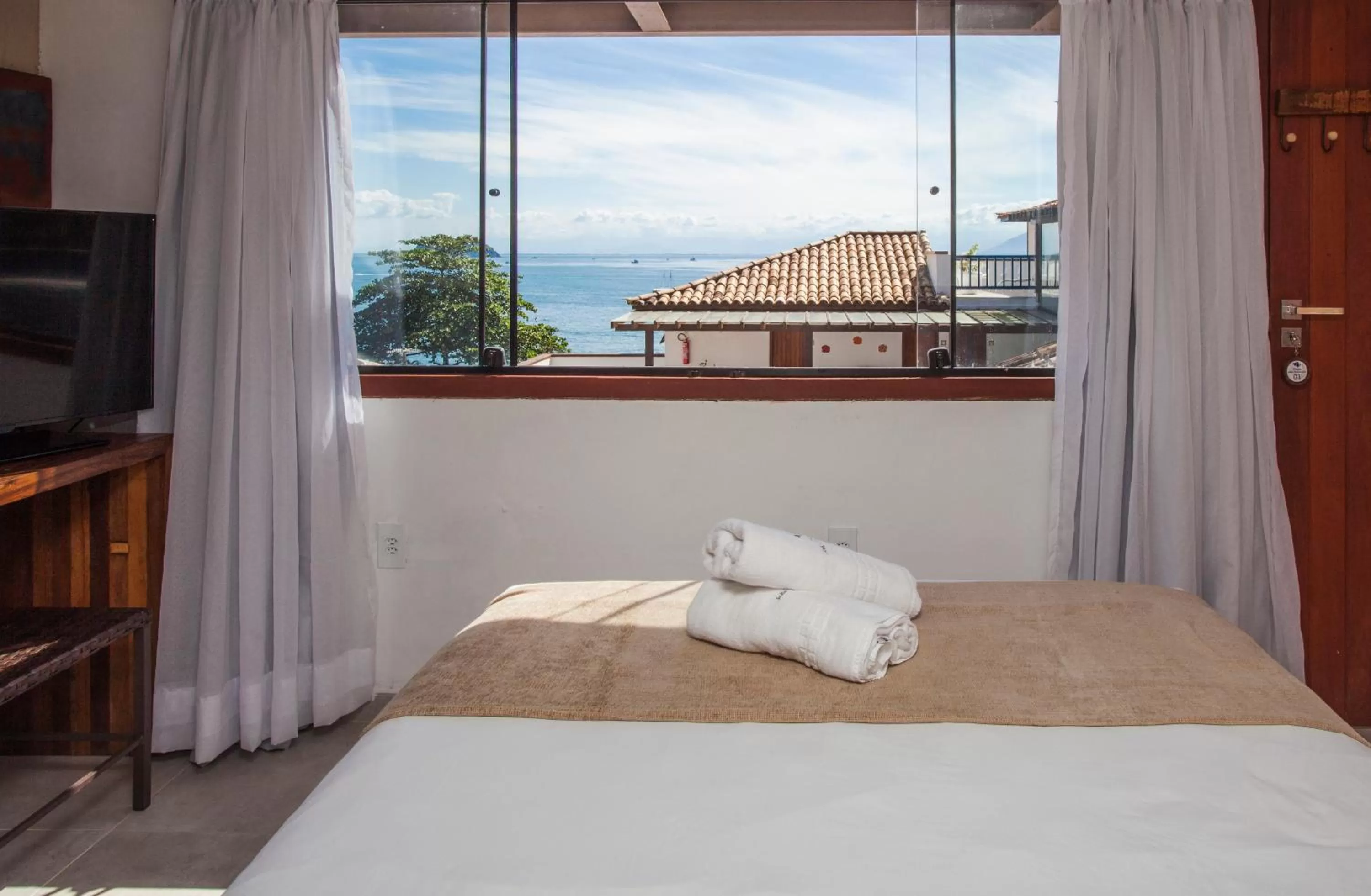 Bed in Pousada Praia João Fernandes