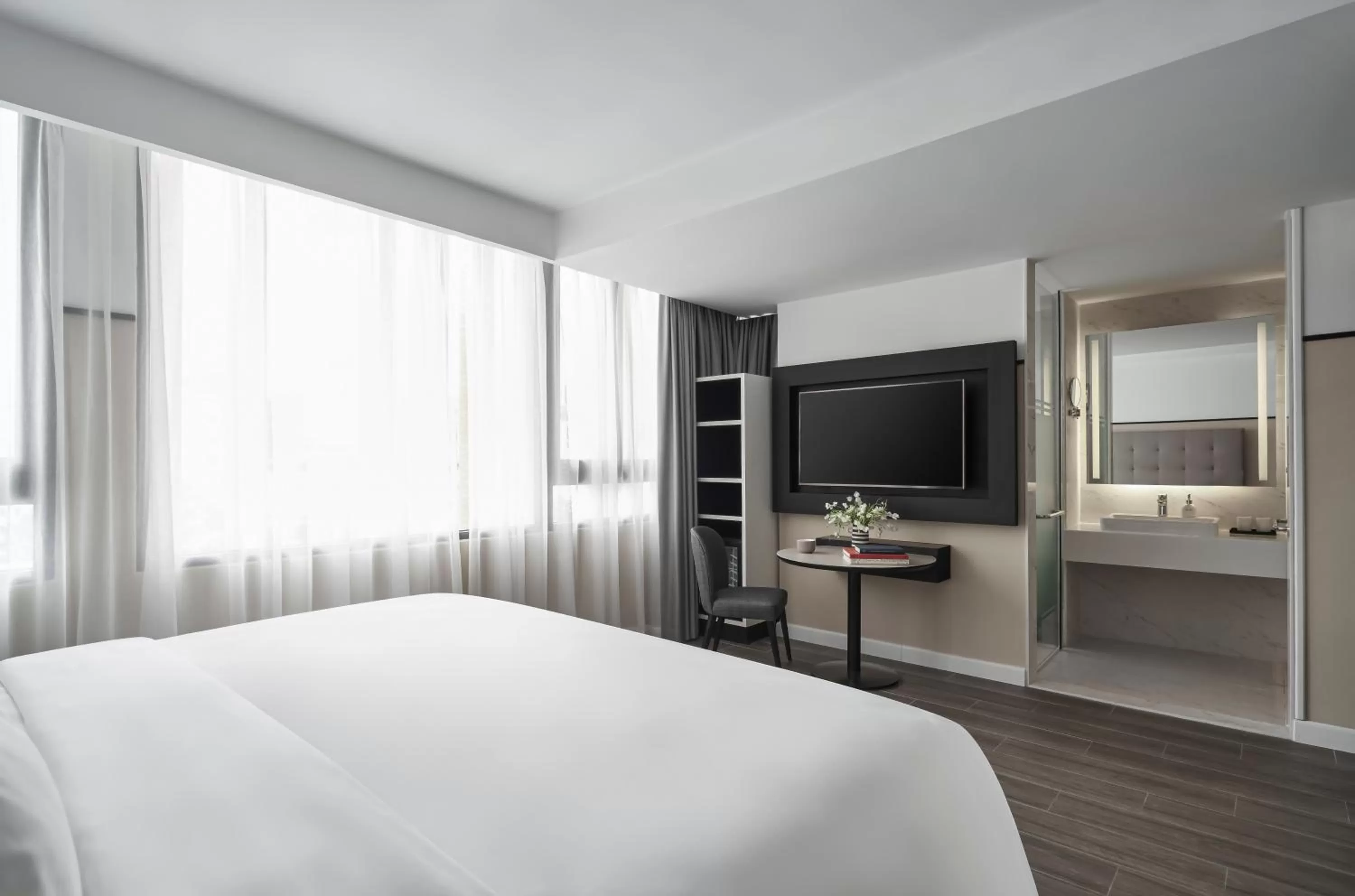 TV and multimedia, Bed in M Village Hotel Tôn Thất Đạm