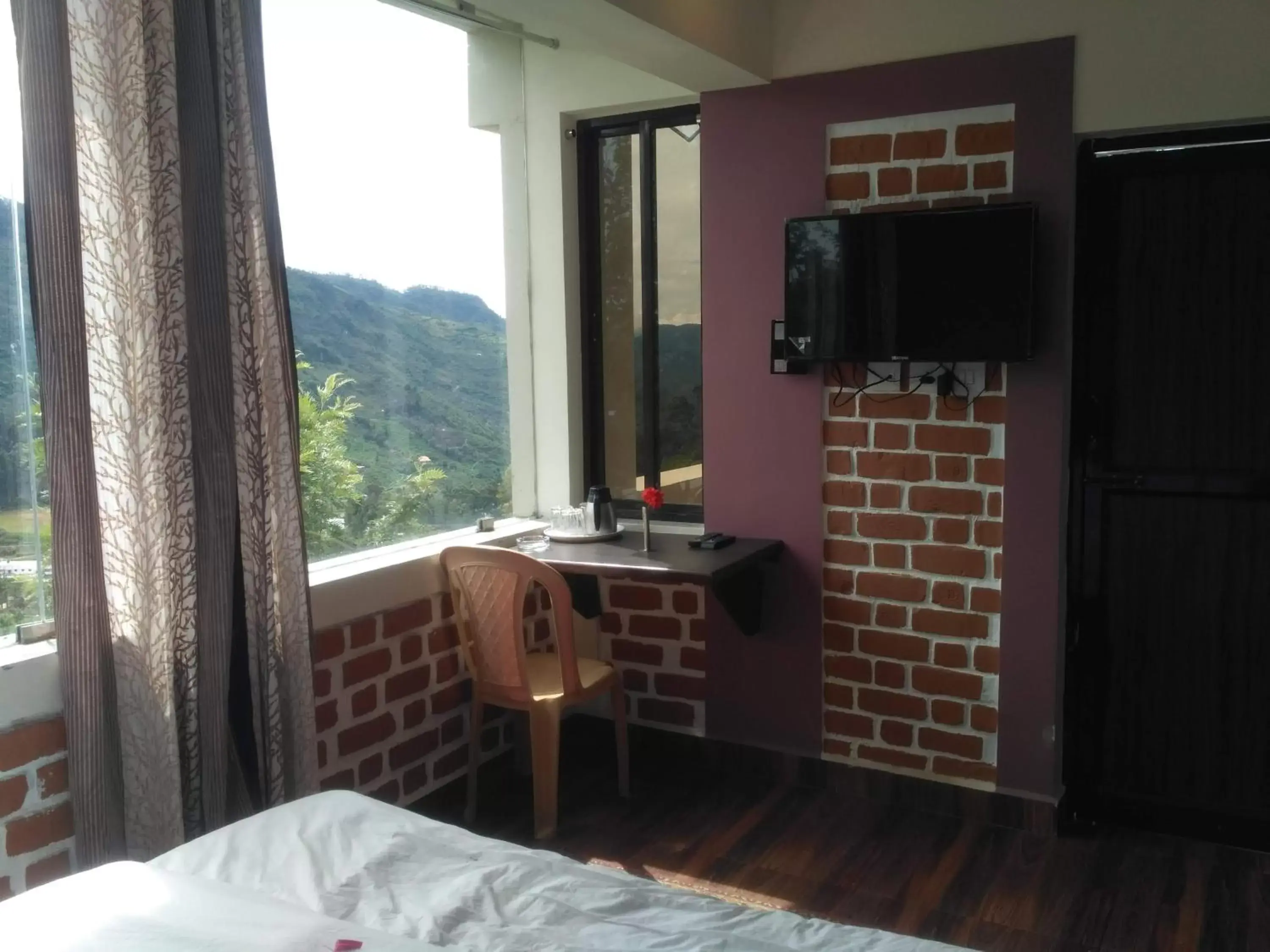 Quadruple Room with Garden View in The Meadows Quadruple Room with Garden View in The Meadows