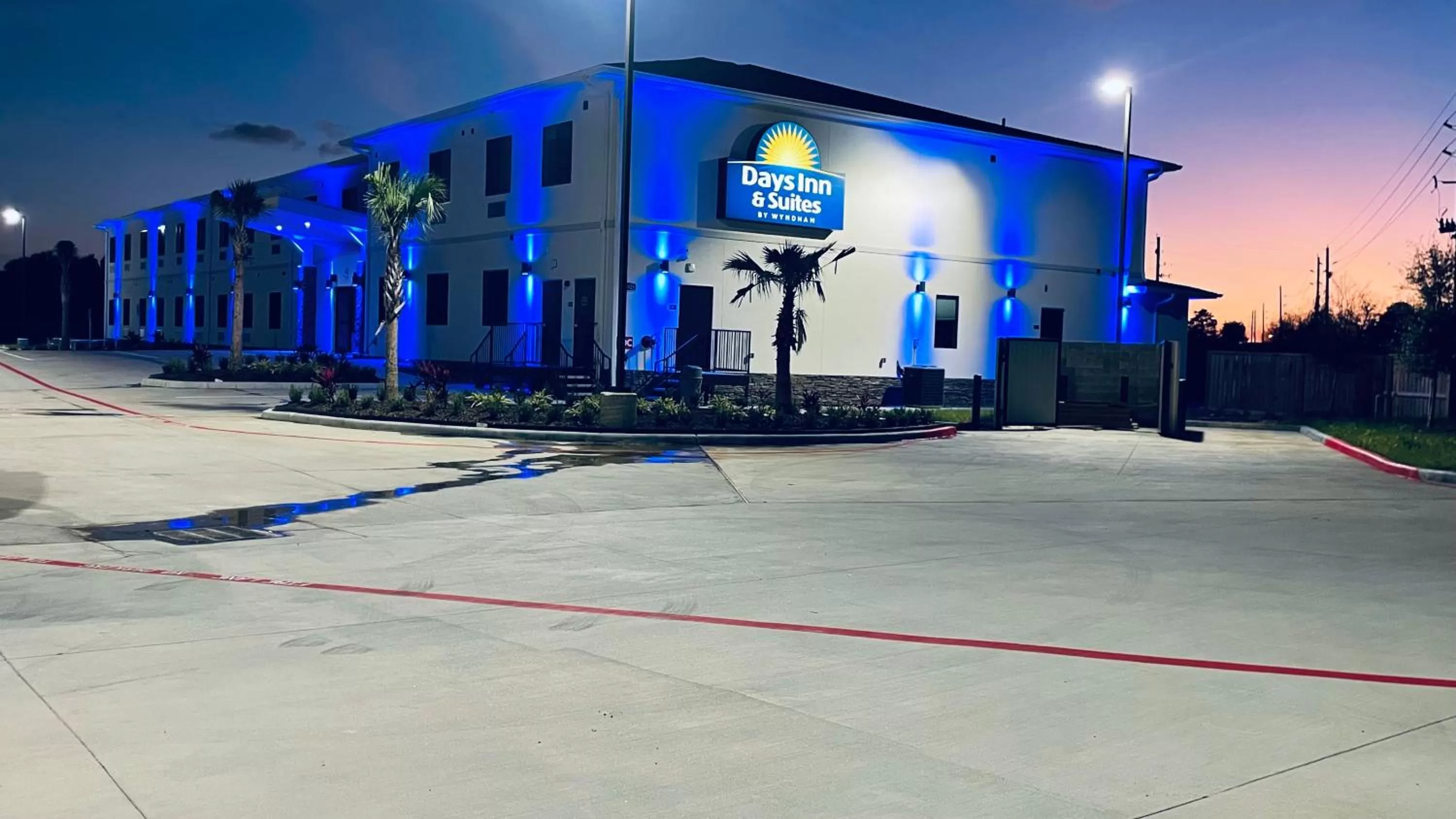 Property building in Days Inn & Suites by Wyndham Greater Tomball