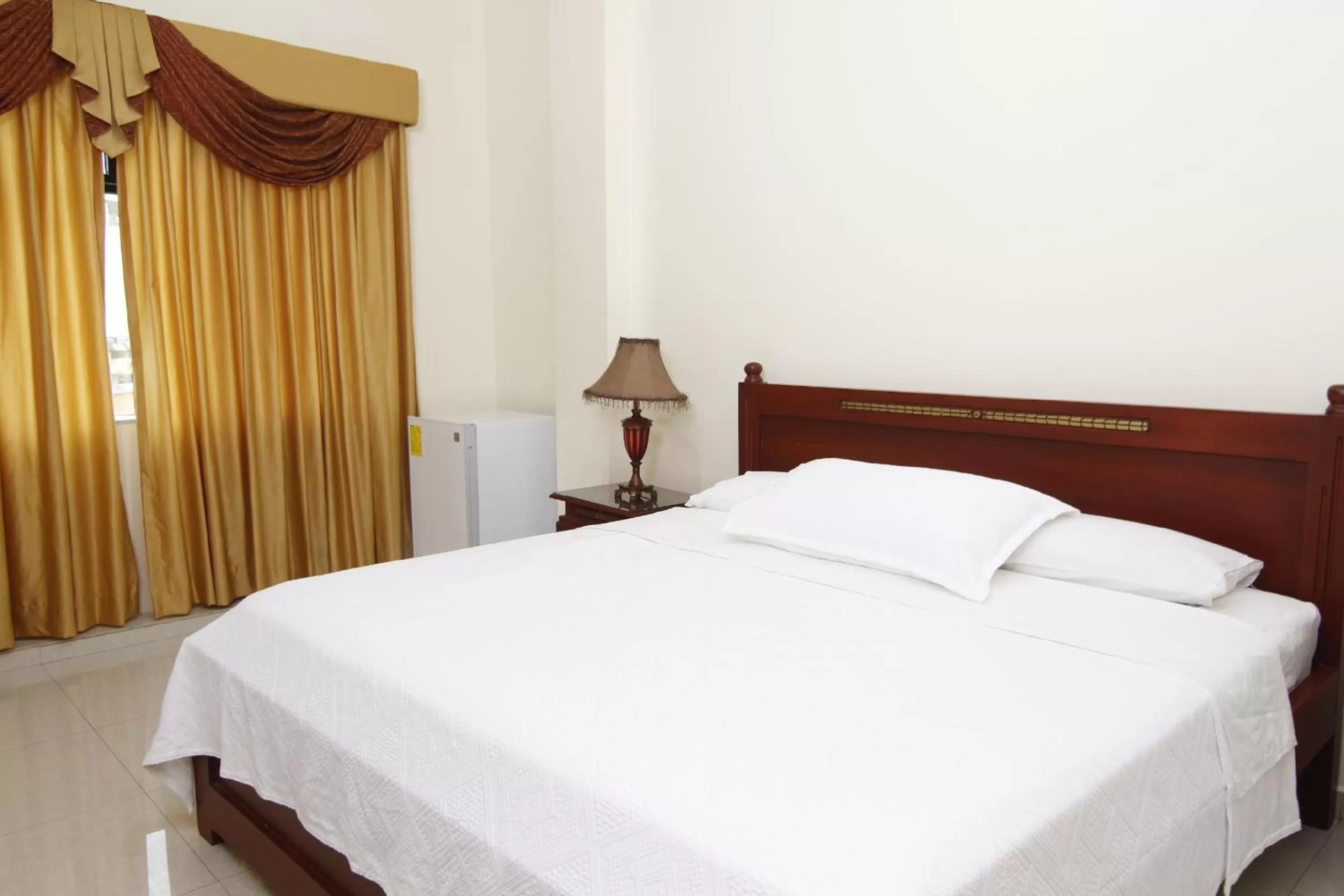 Bed in Hotel Versailles Internacional