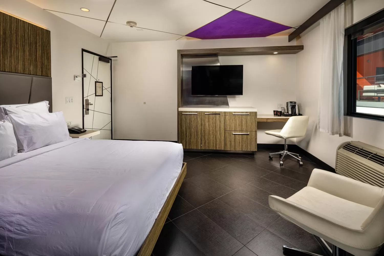 Photo of the whole room, Bed in The Moment Hotel