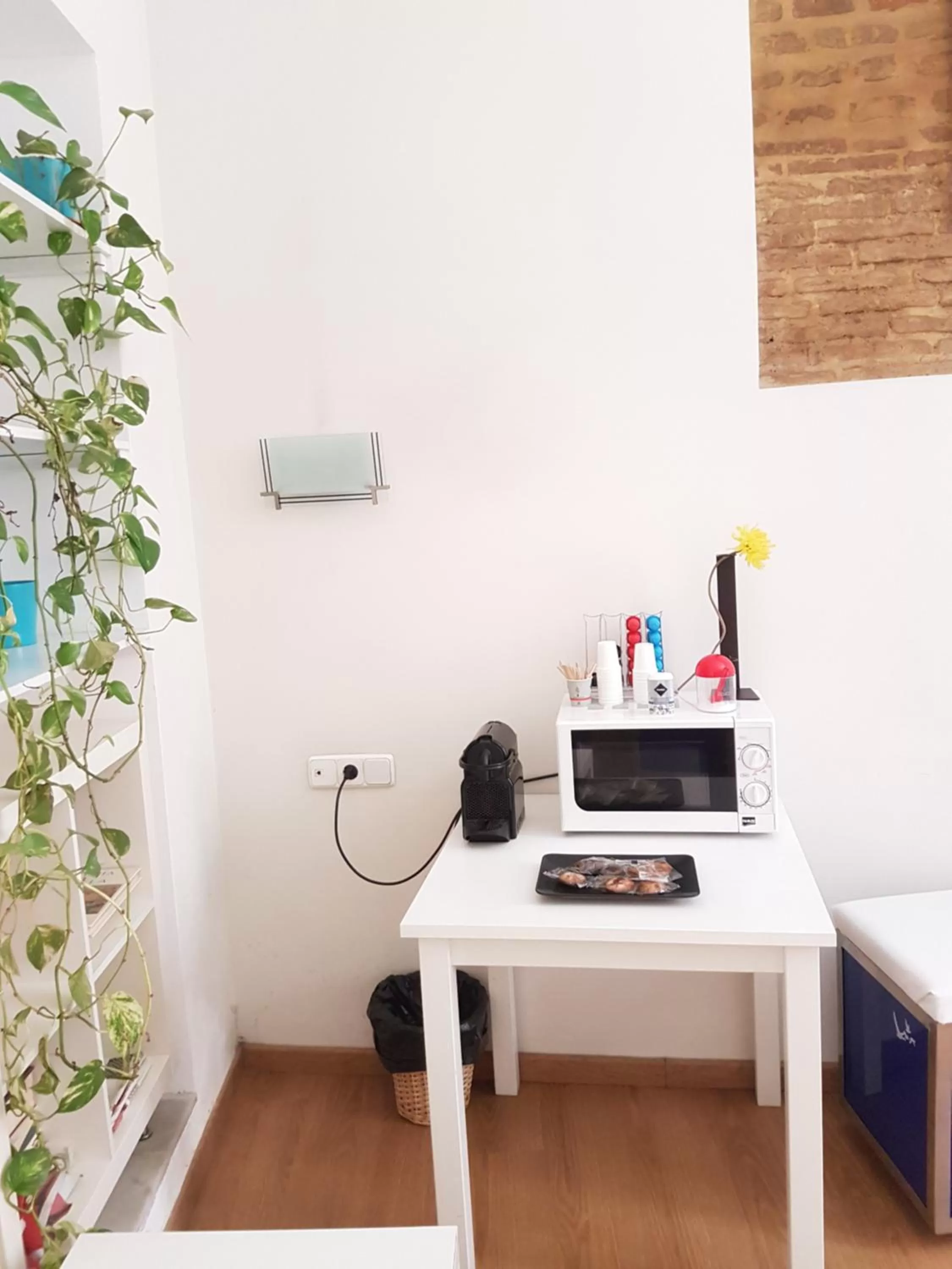 Communal kitchen in Hotel y Apartamentos Doña Lola