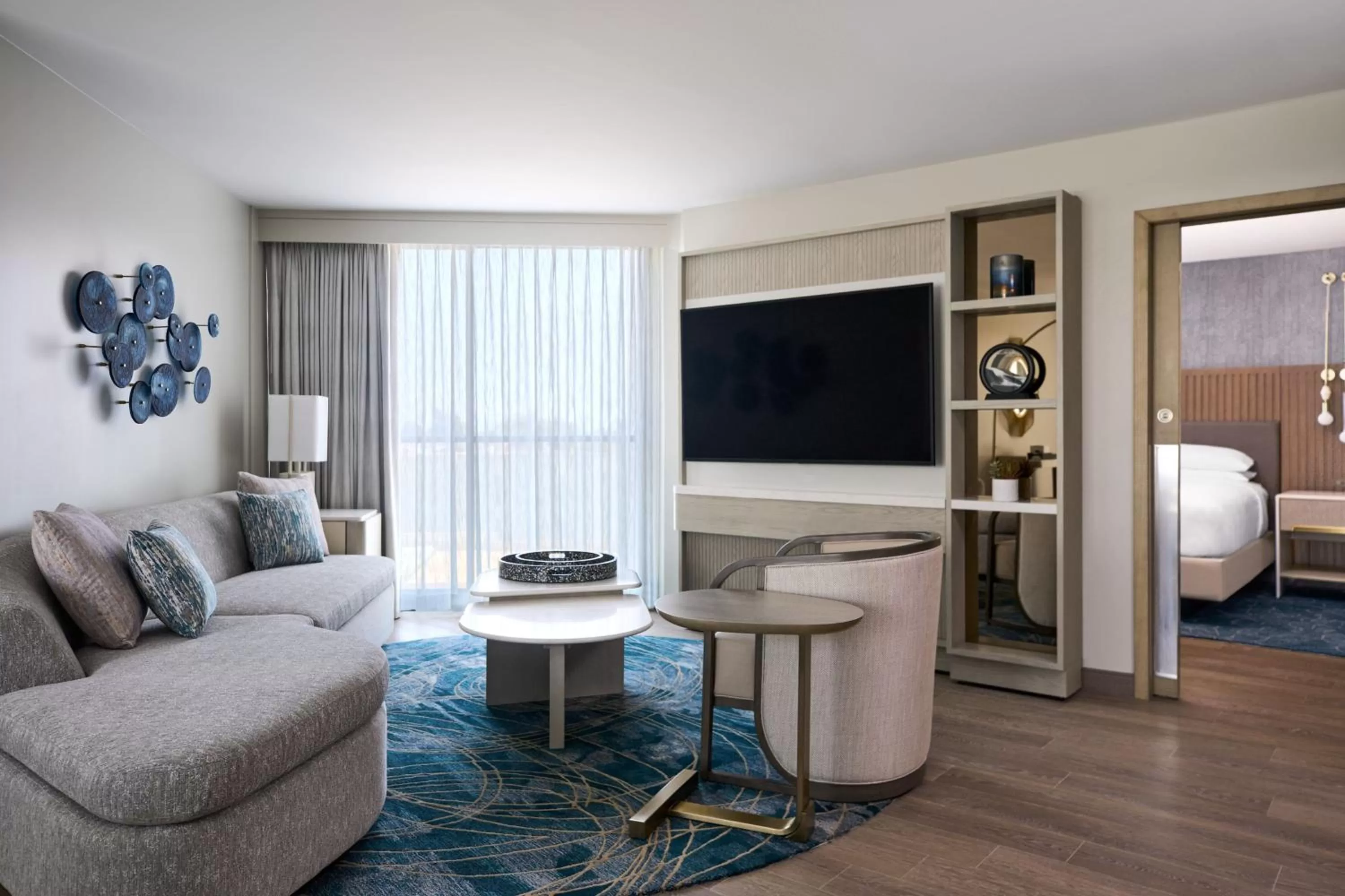 Living room, Bed in VEA Newport Beach, a Marriott Resort & Spa