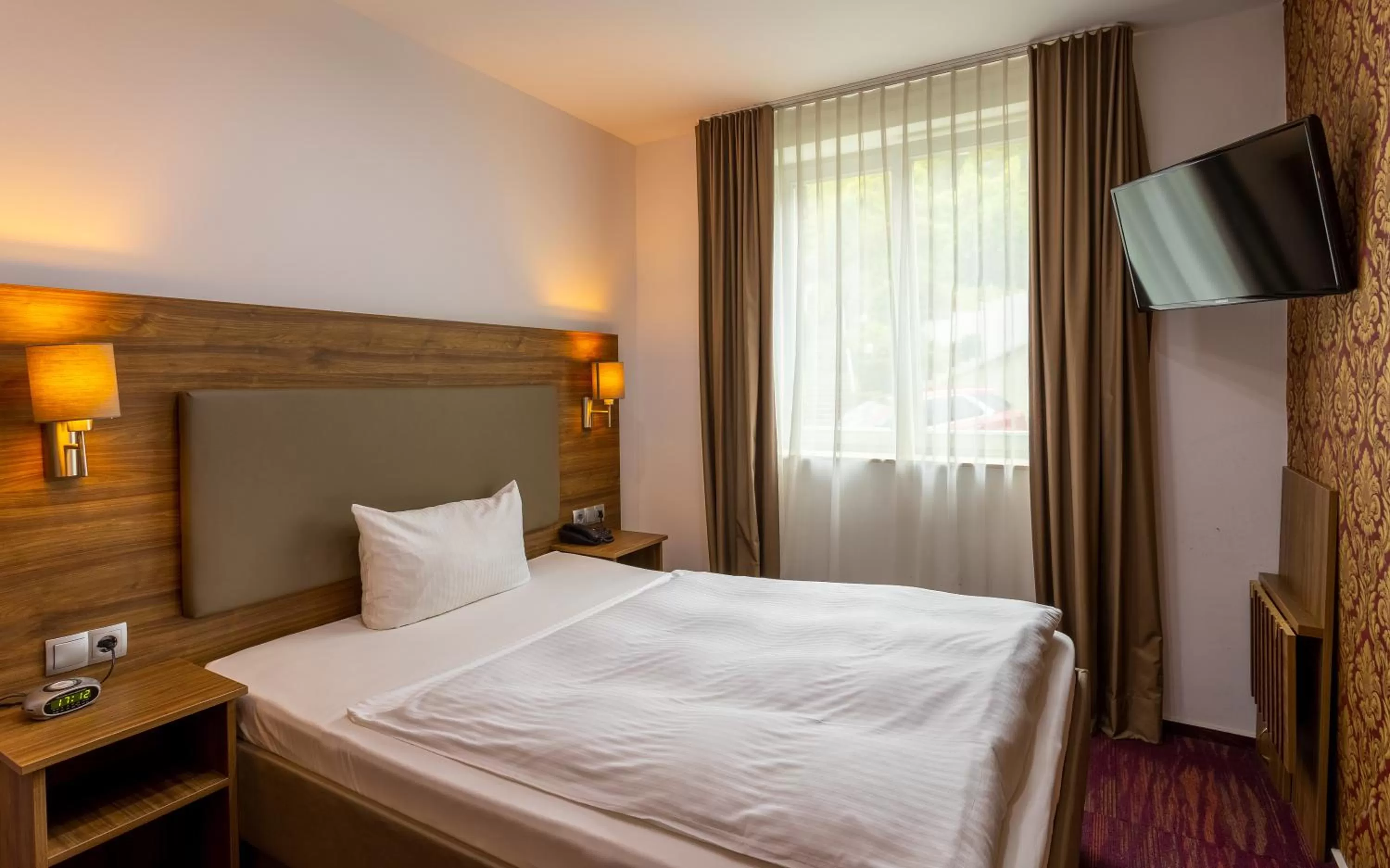 Photo of the whole room, Bed in Waldhotel Eskeshof