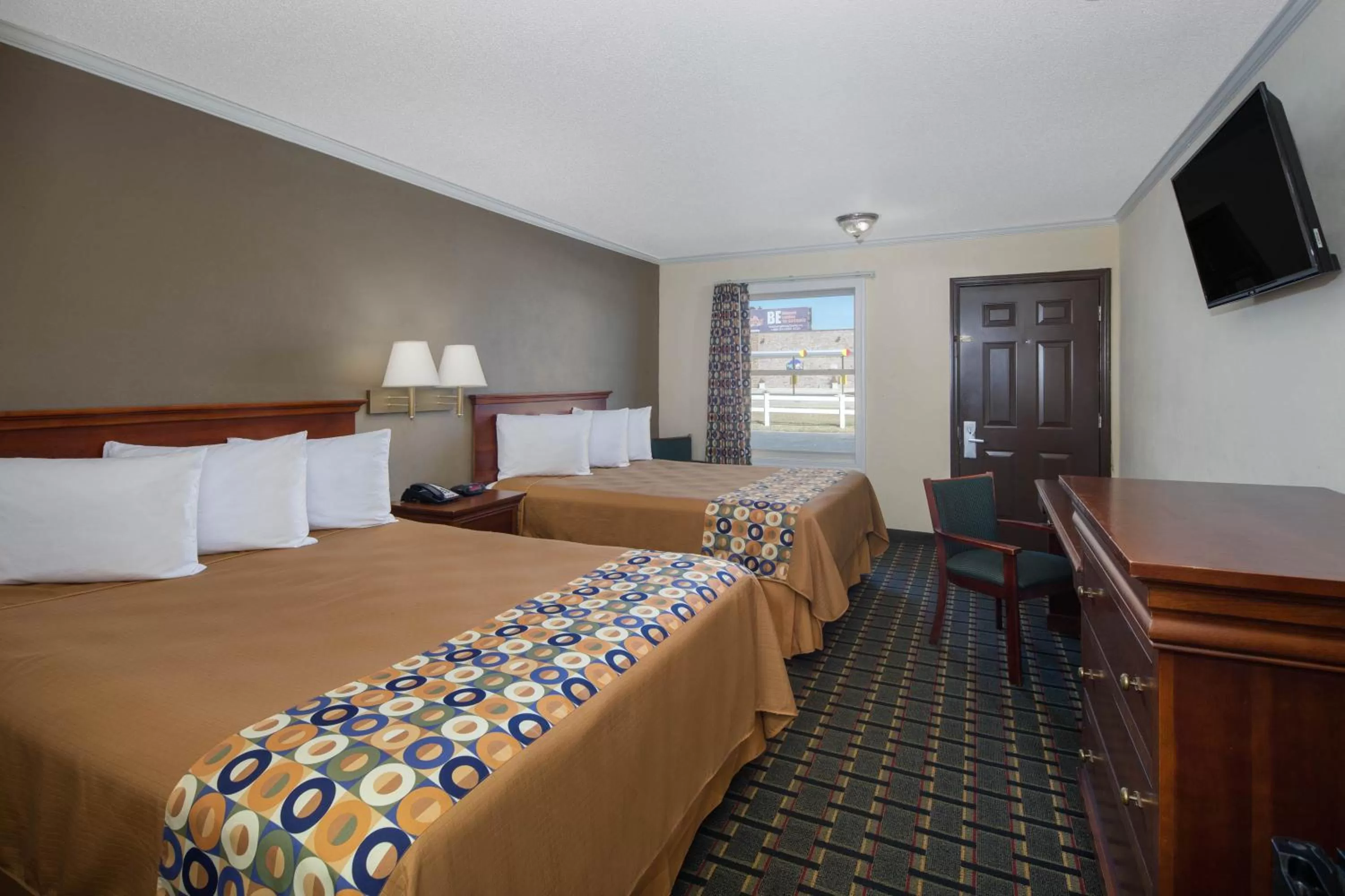 Bed in Travelodge by Wyndham Orangeburg